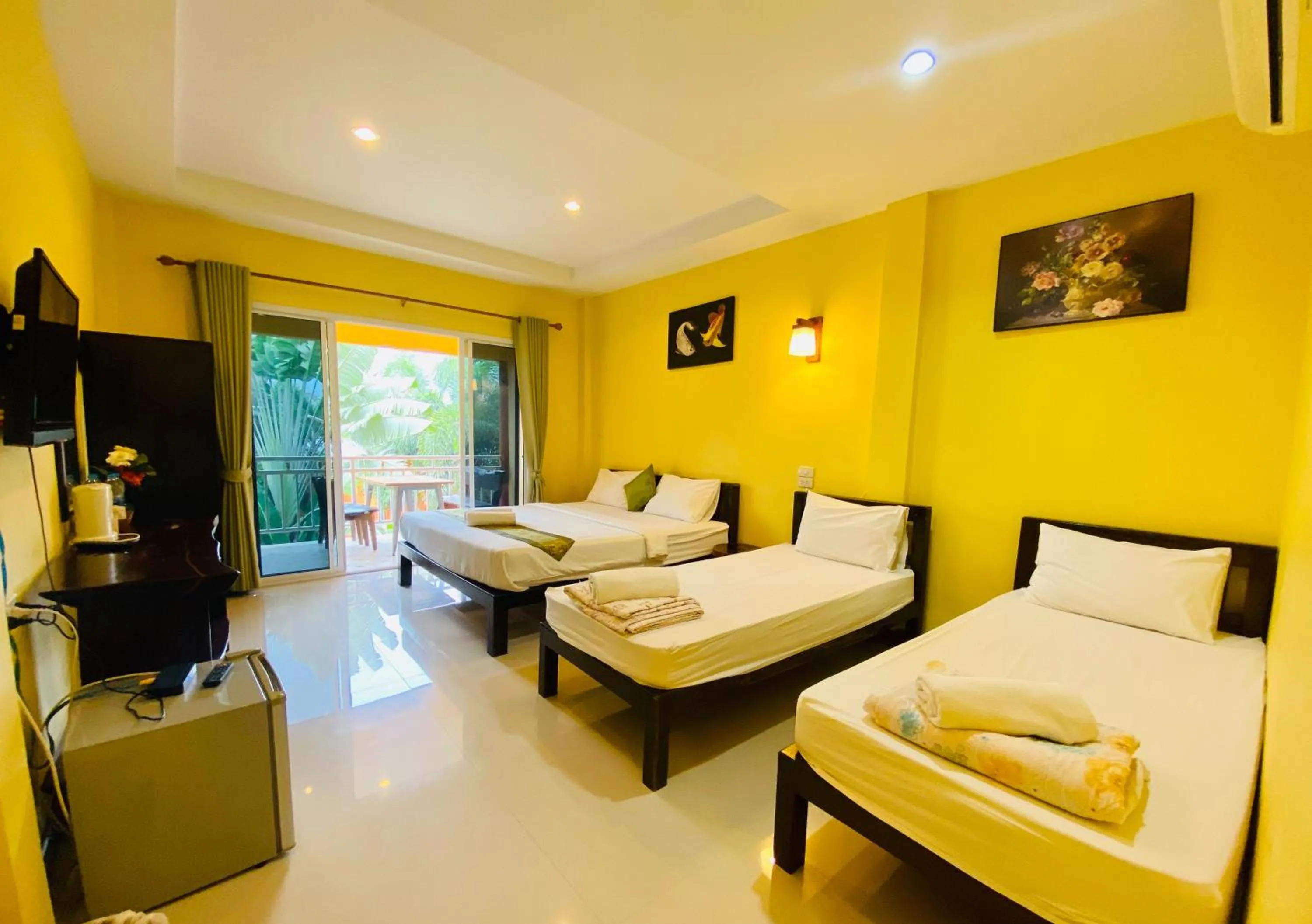 Bed in Pranmanee Beach Resort