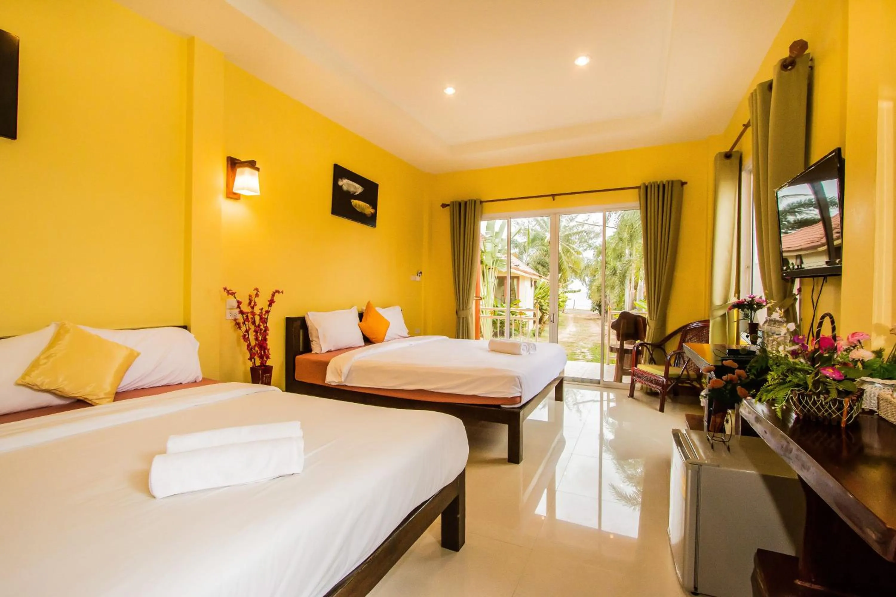 Bed in Pranmanee Beach Resort