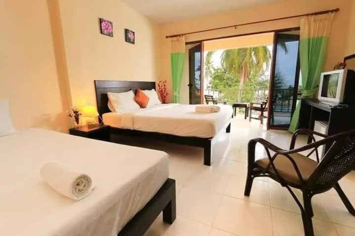 Bed in Pranmanee Beach Resort