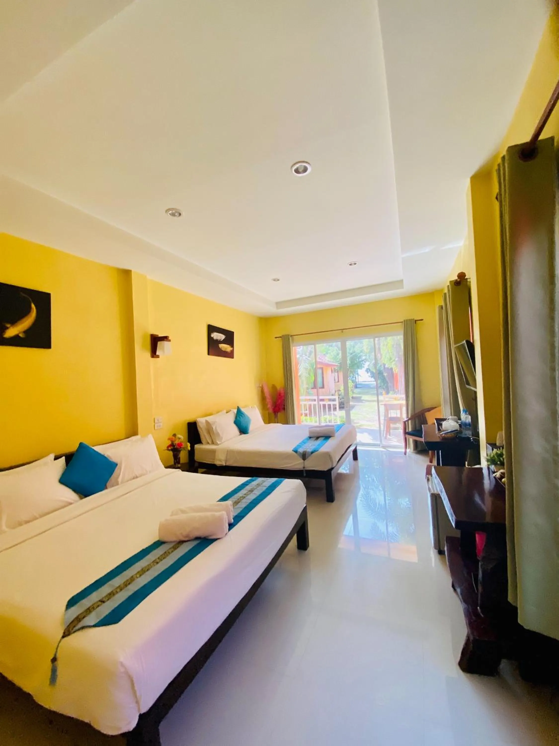 Bed in Pranmanee Beach Resort