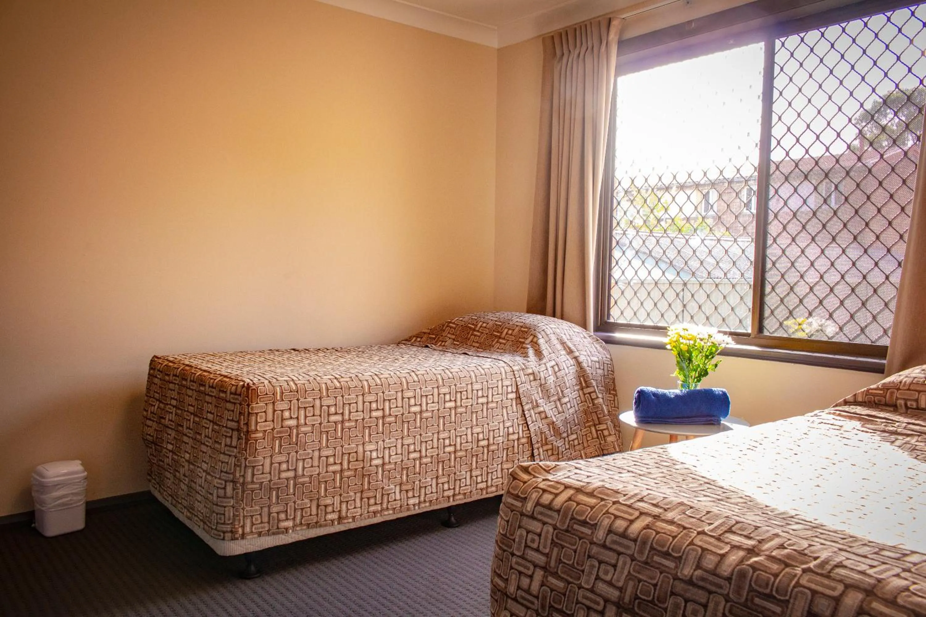 Bedroom in Liberty Plains Motor Inn