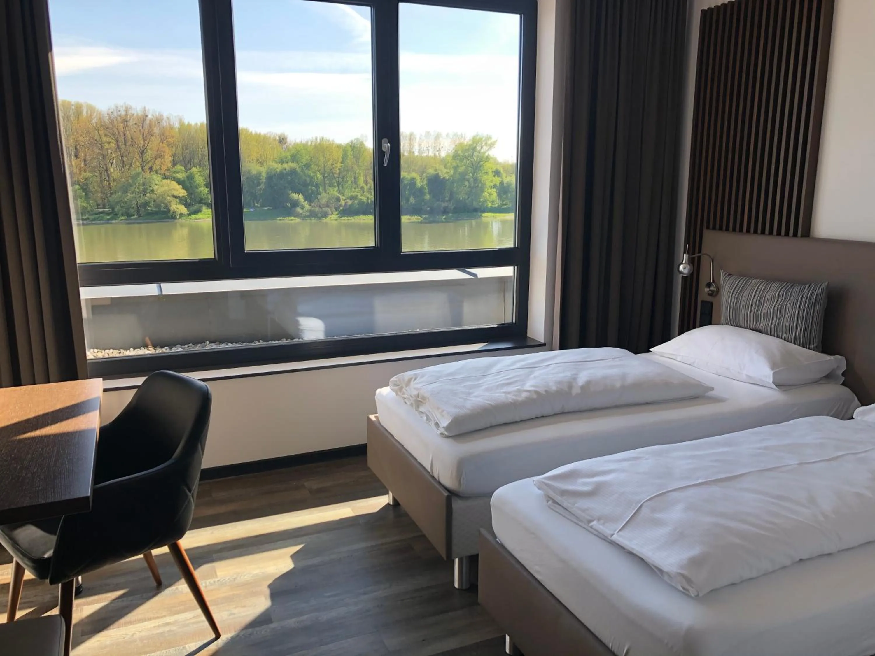 Photo of the whole room, Bed in Hotel Donauhof Mauthausen