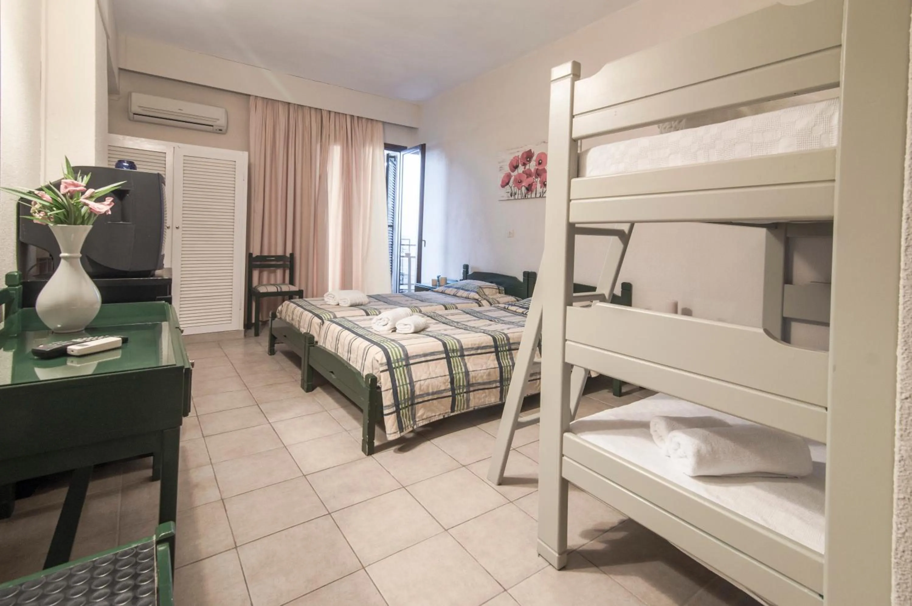 Photo of the whole room, Bed in Canvas by Mitsis Belvedere