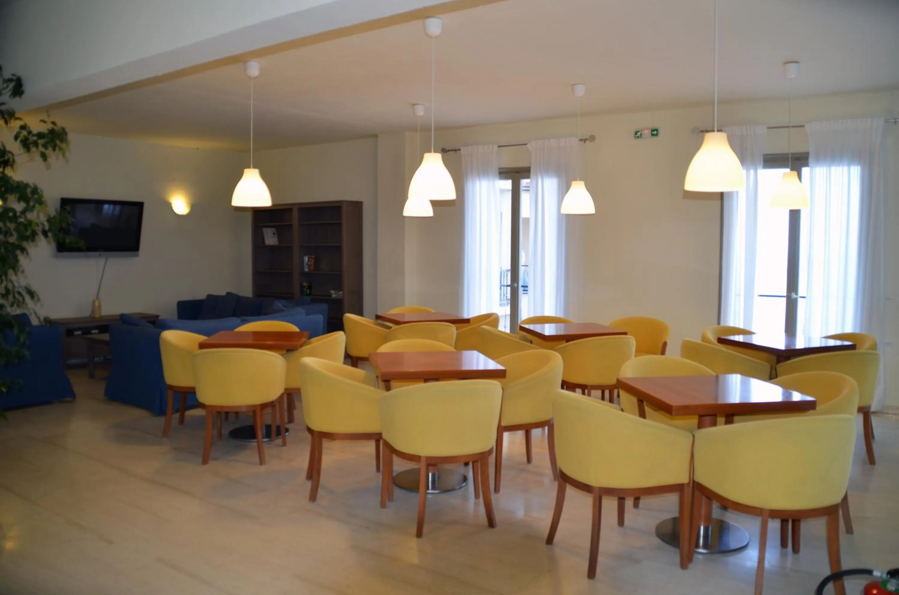 Communal lounge/ TV room in Canvas by Mitsis Belvedere