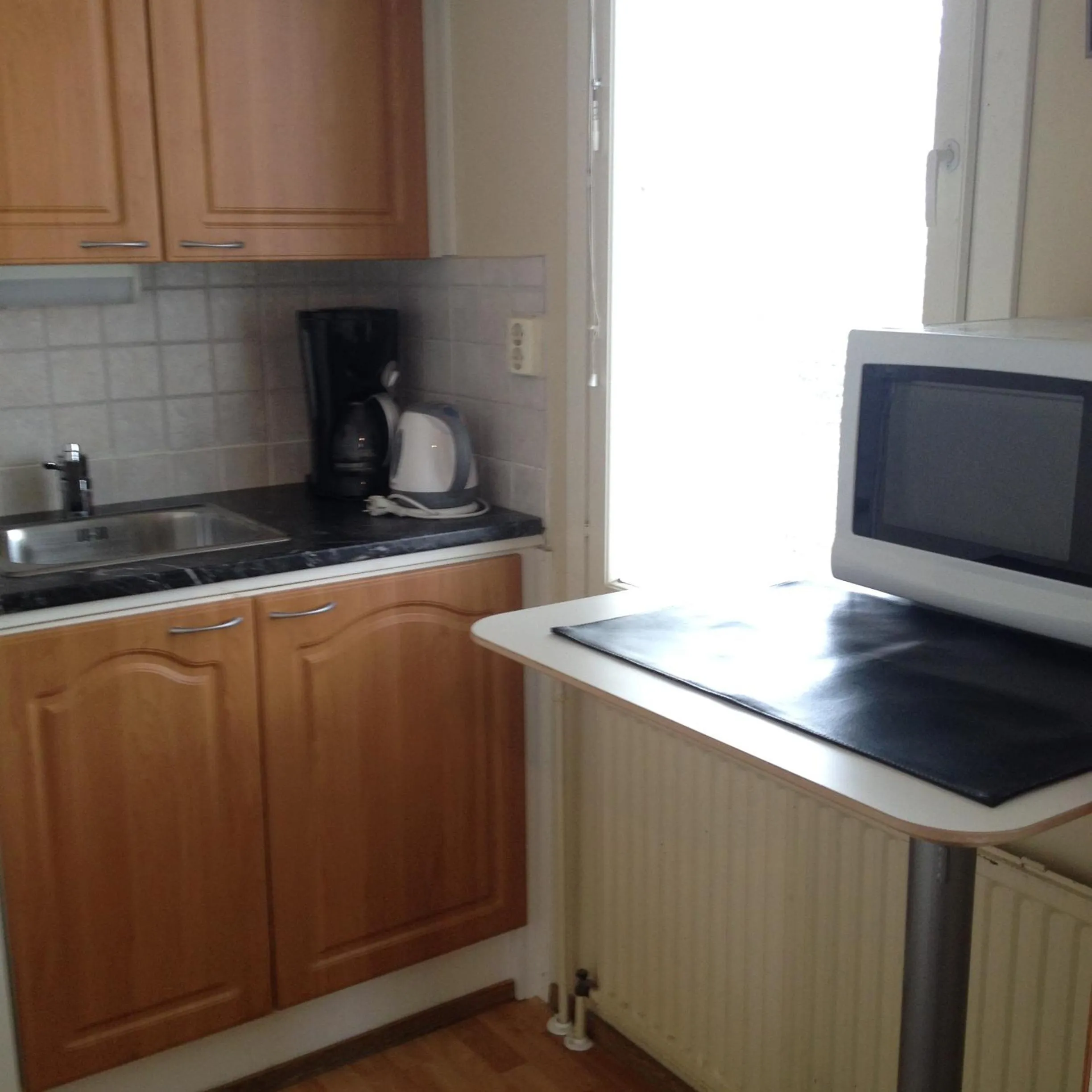 Kitchen or kitchenette in Hotel Lamminpää