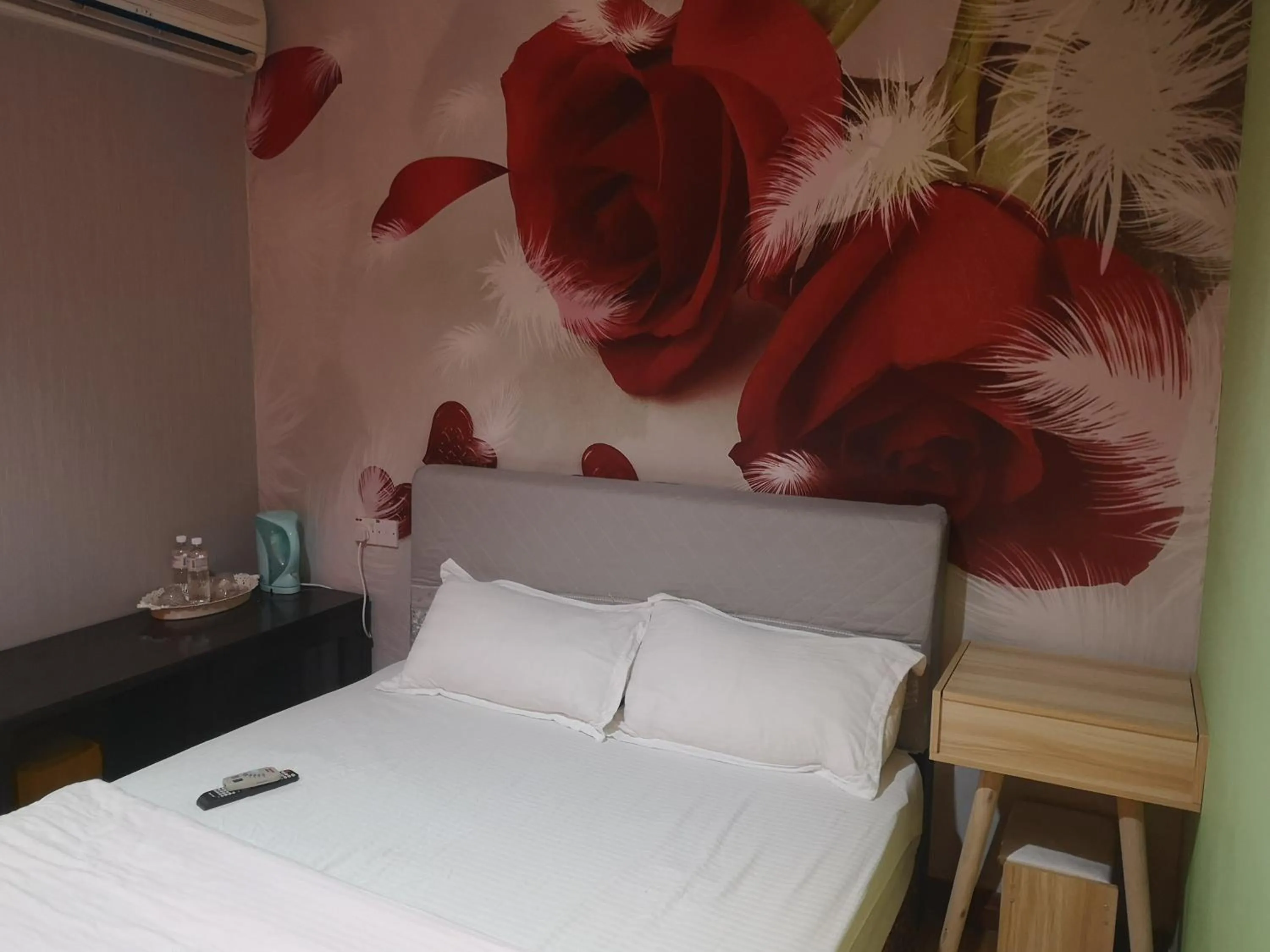 Bed in Home Inn Hotel