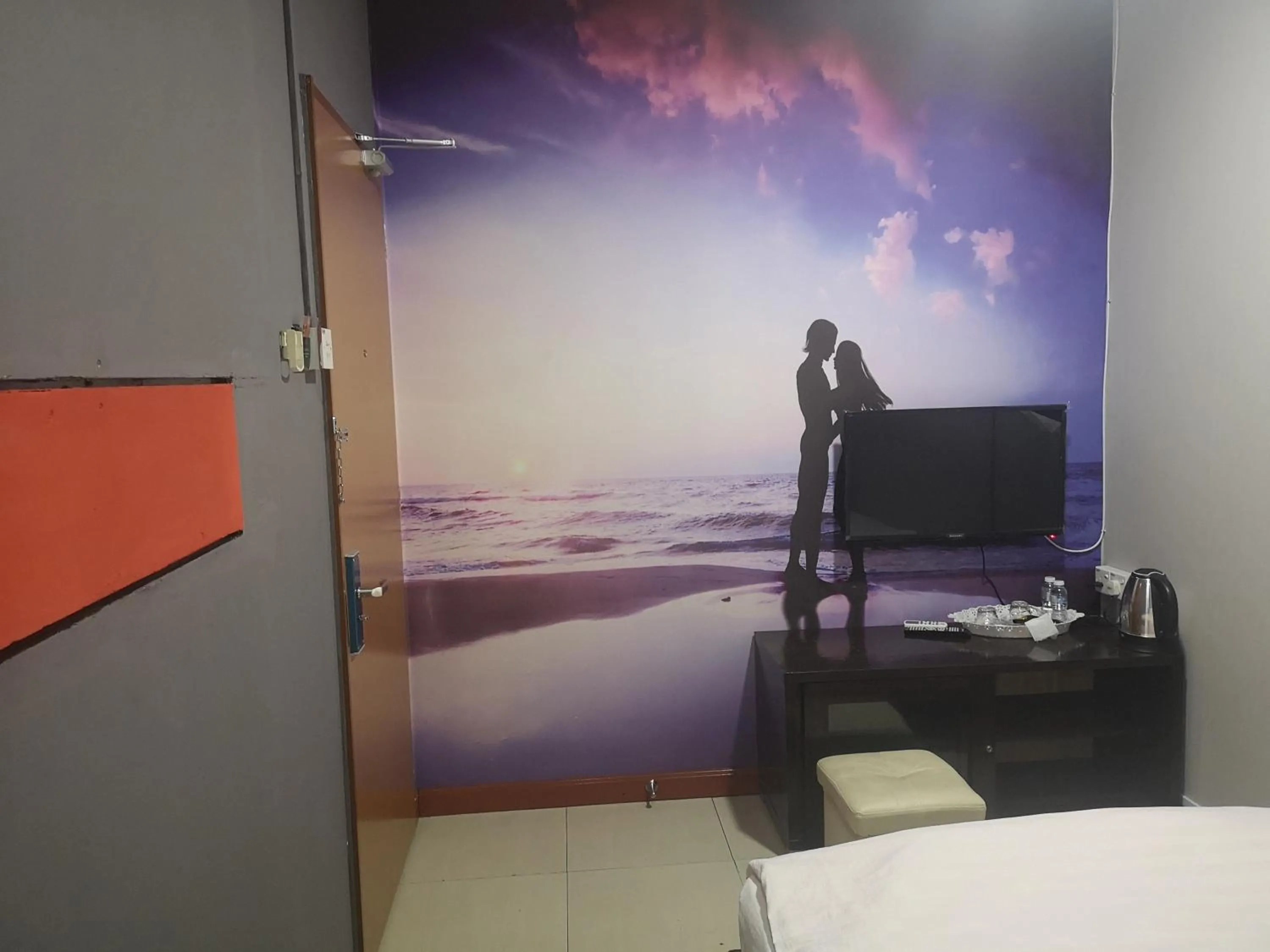 Bed in Home Inn Hotel