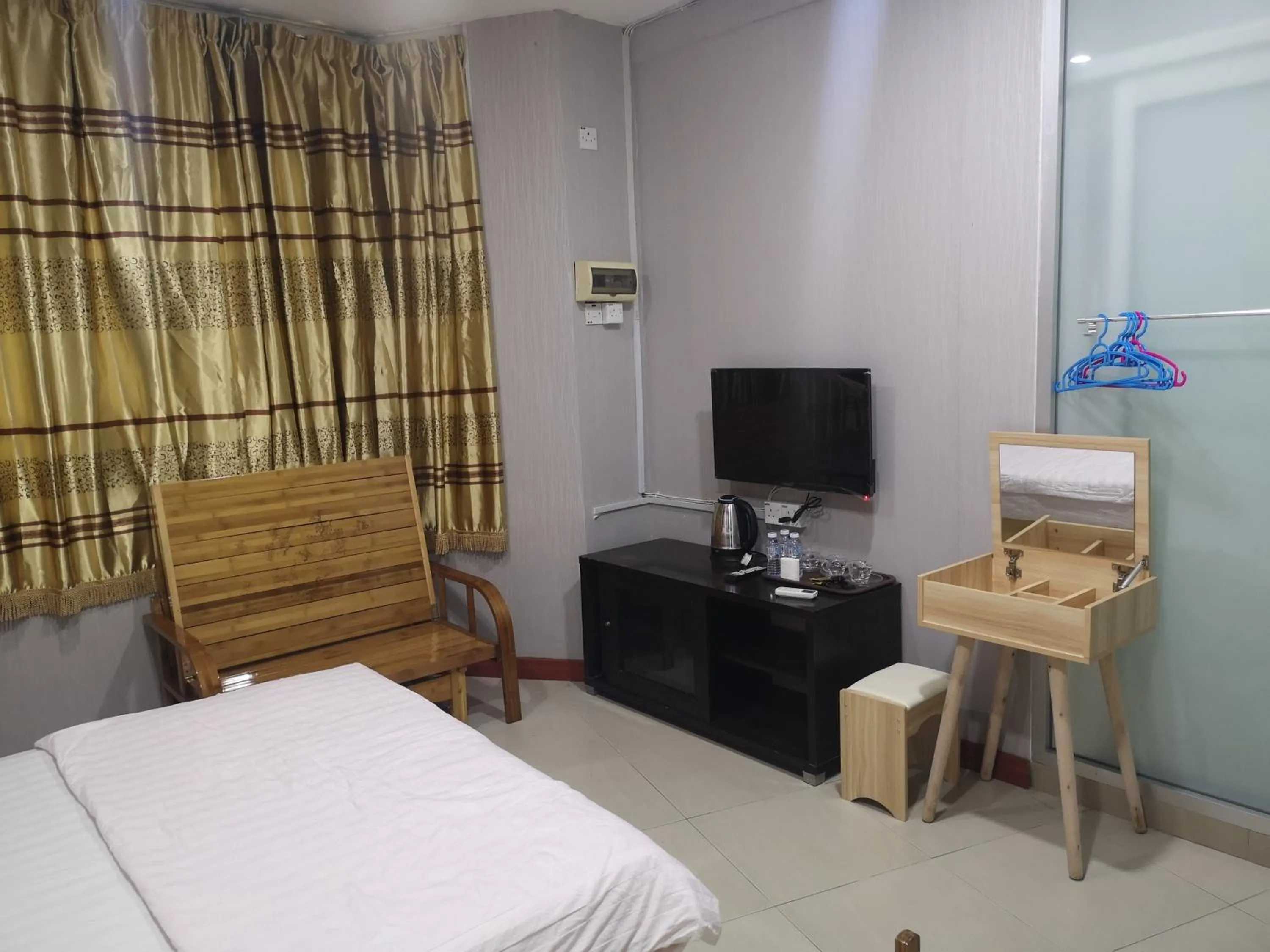 Bed in Home Inn Hotel