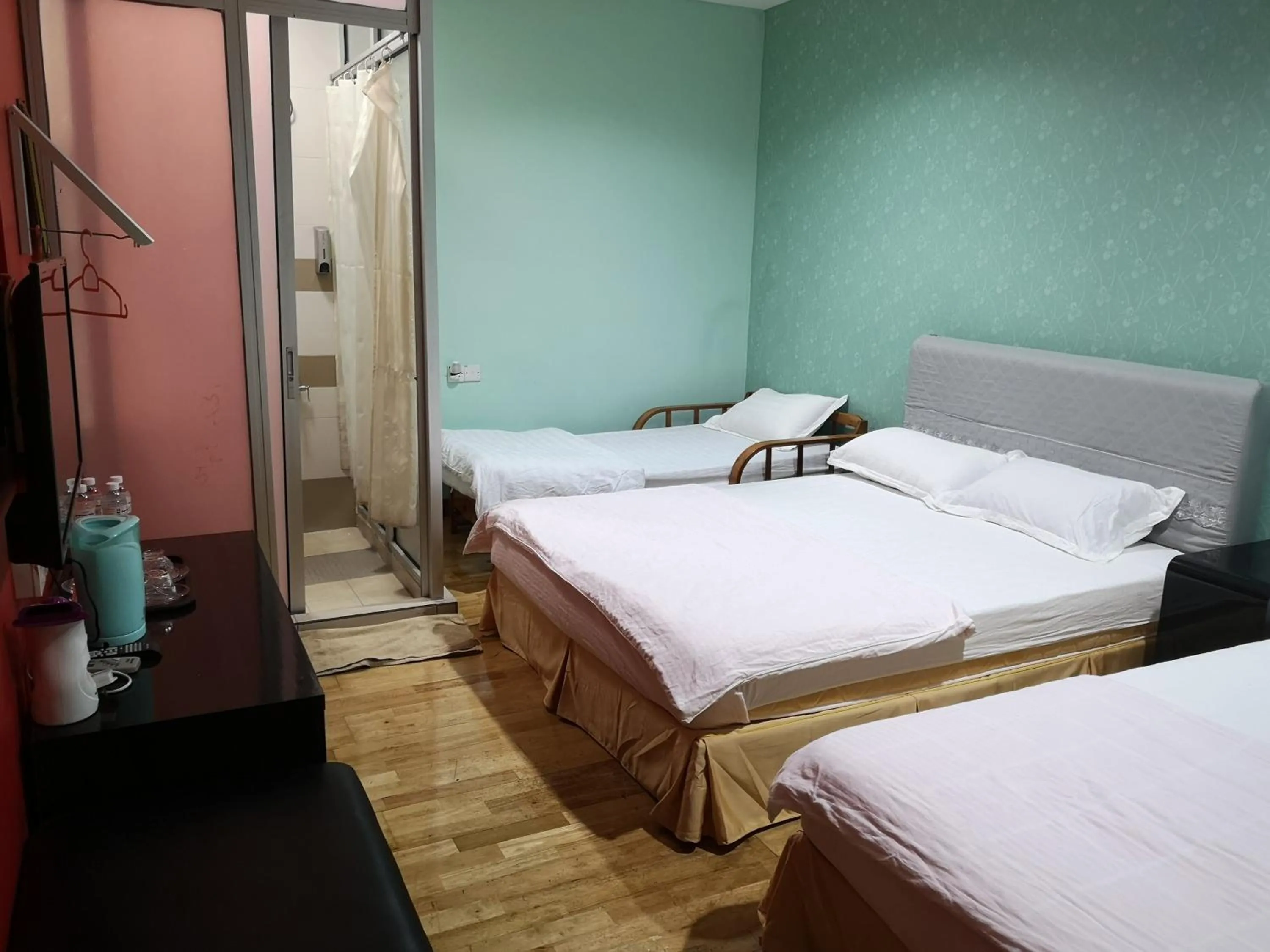 Bed in Home Inn Hotel