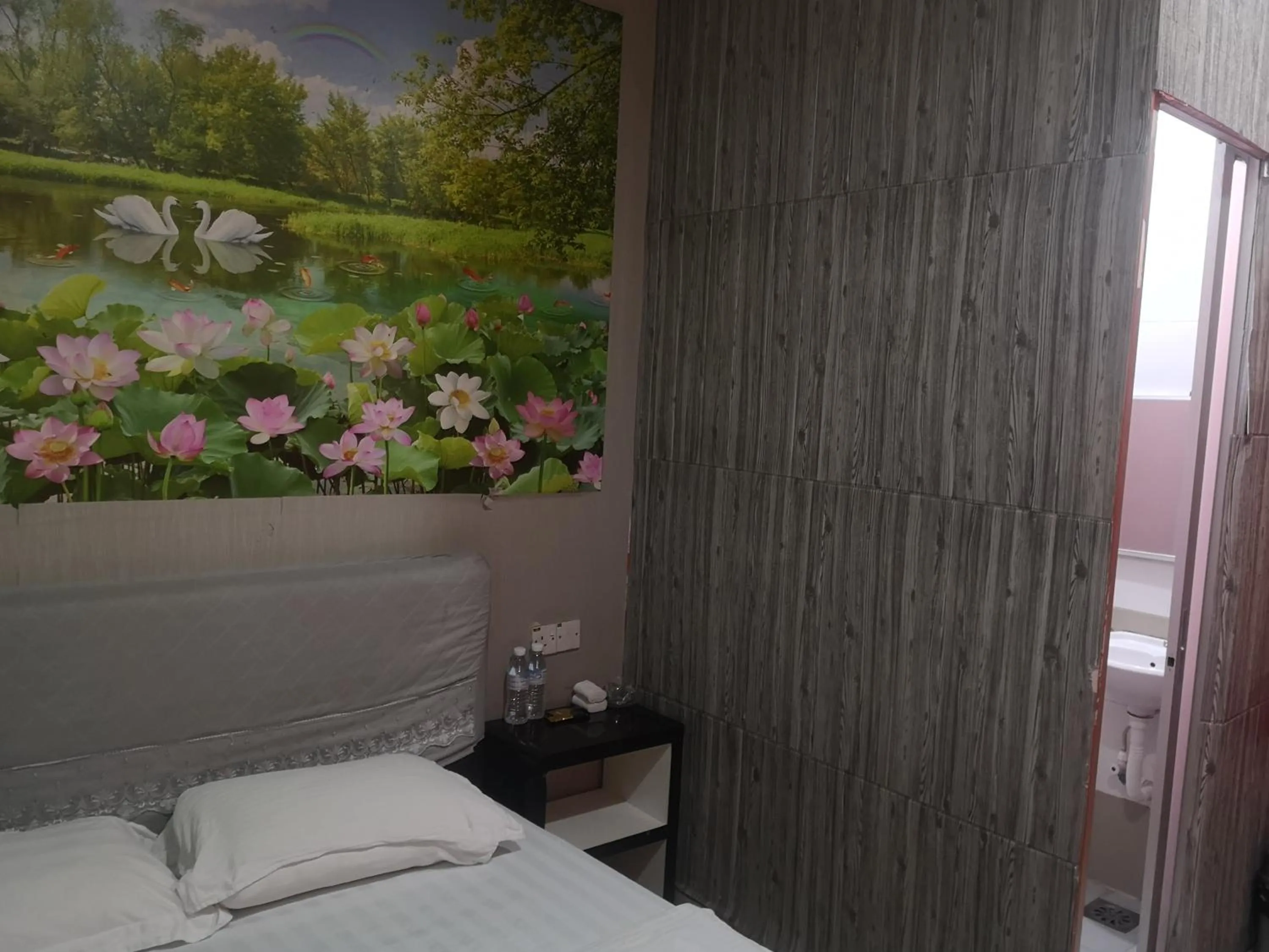 Bed in Home Inn Hotel