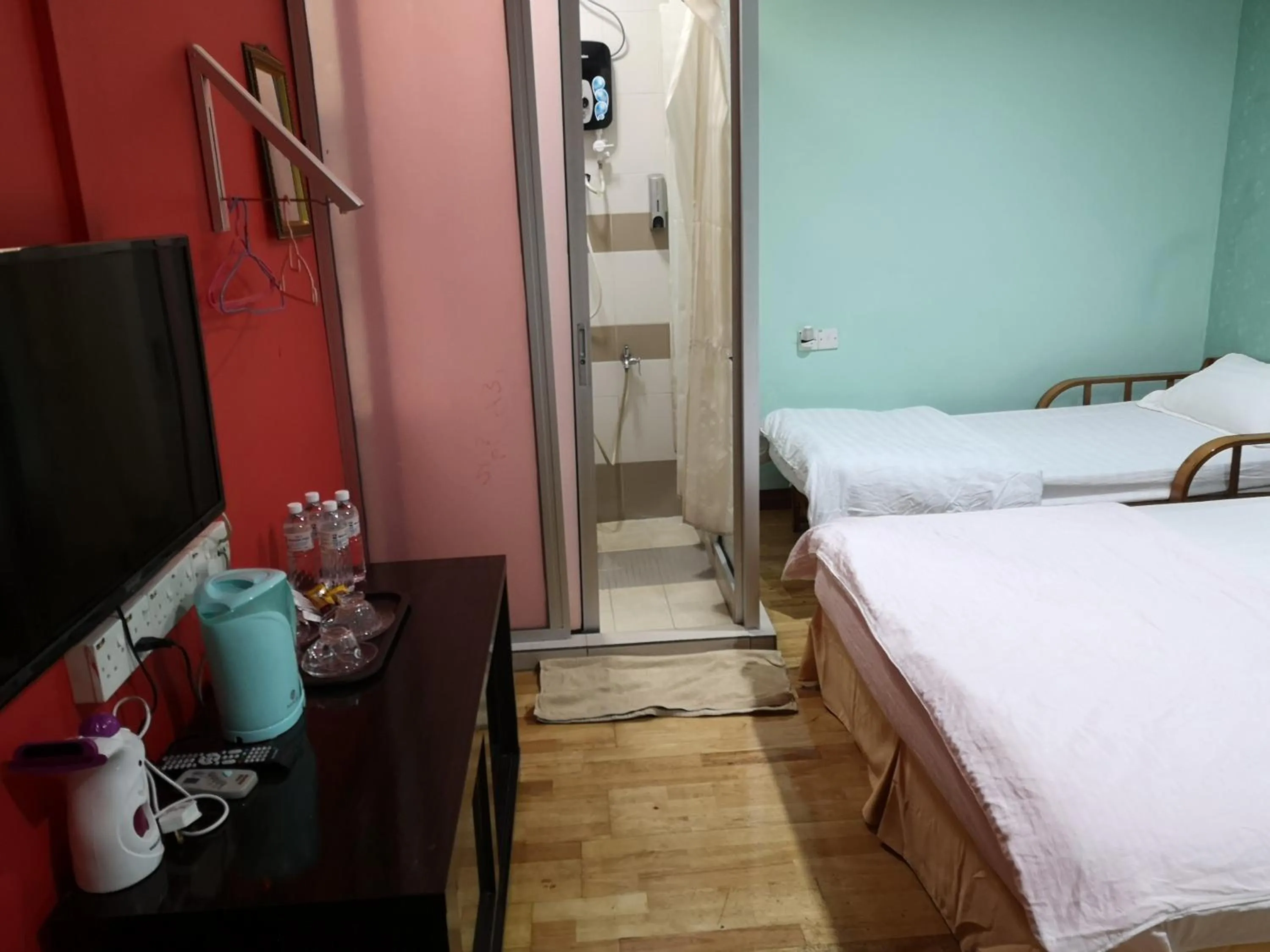 Bed in Home Inn Hotel