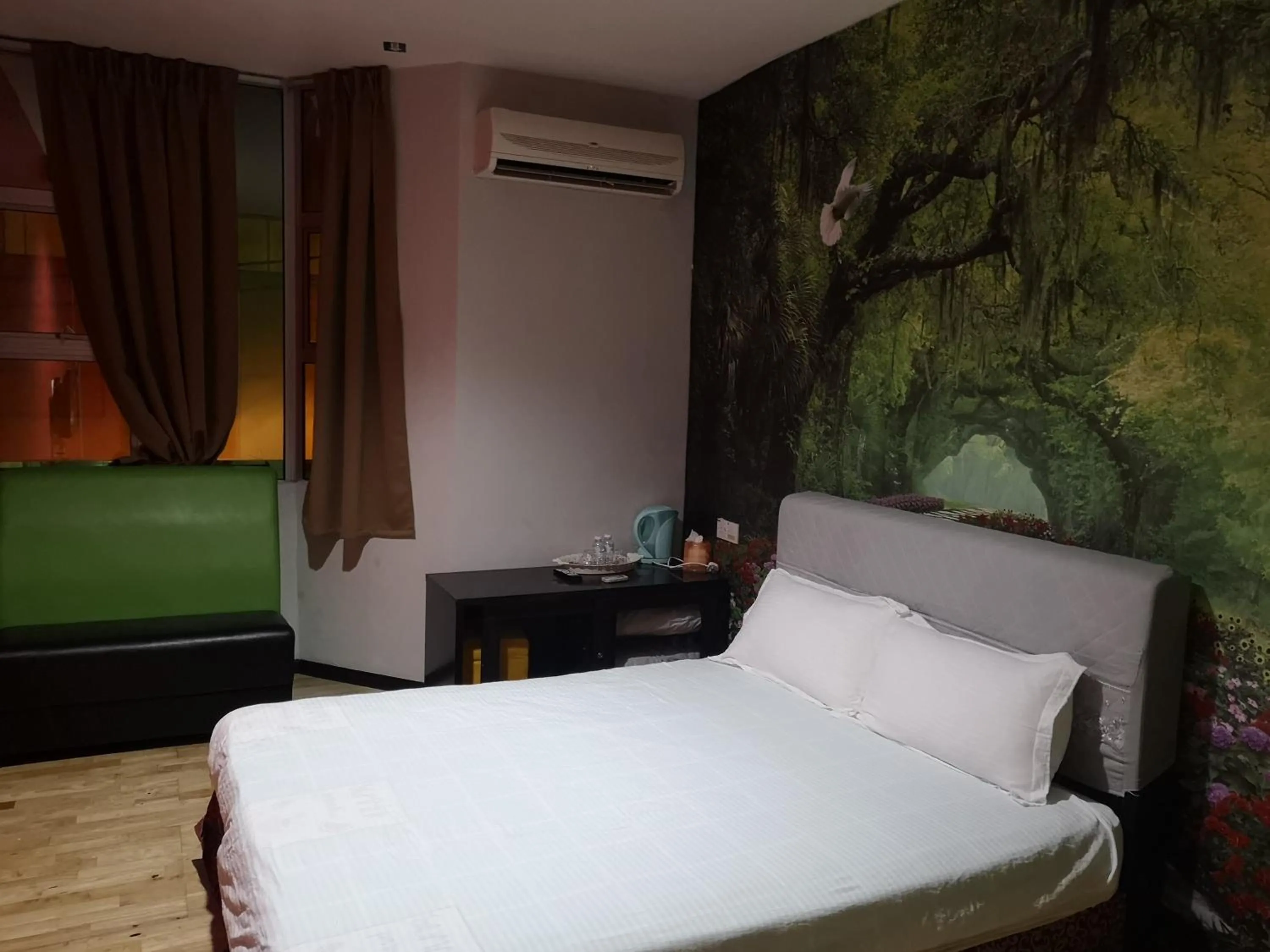 Bed in Home Inn Hotel