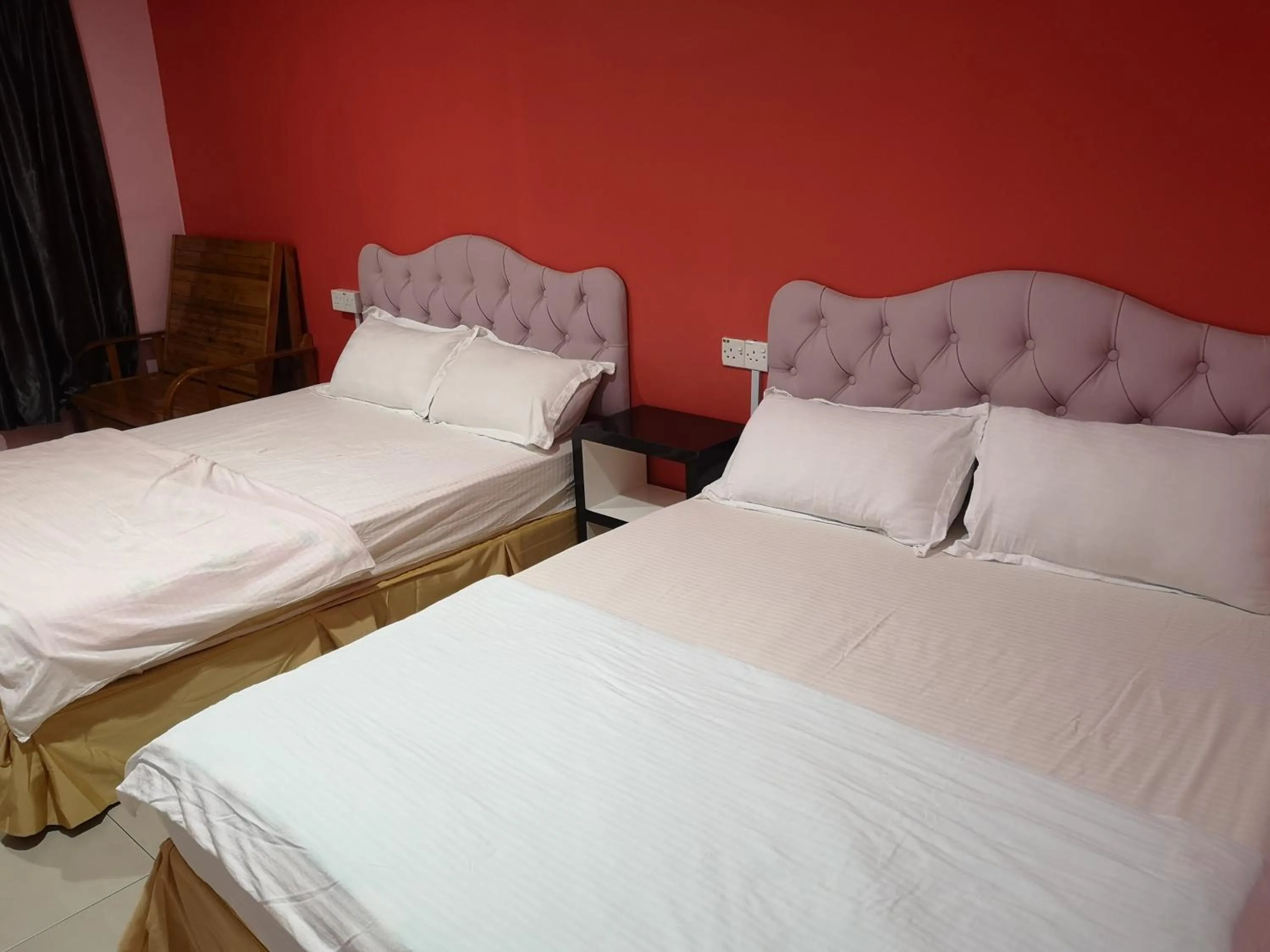 Bed in Home Inn Hotel