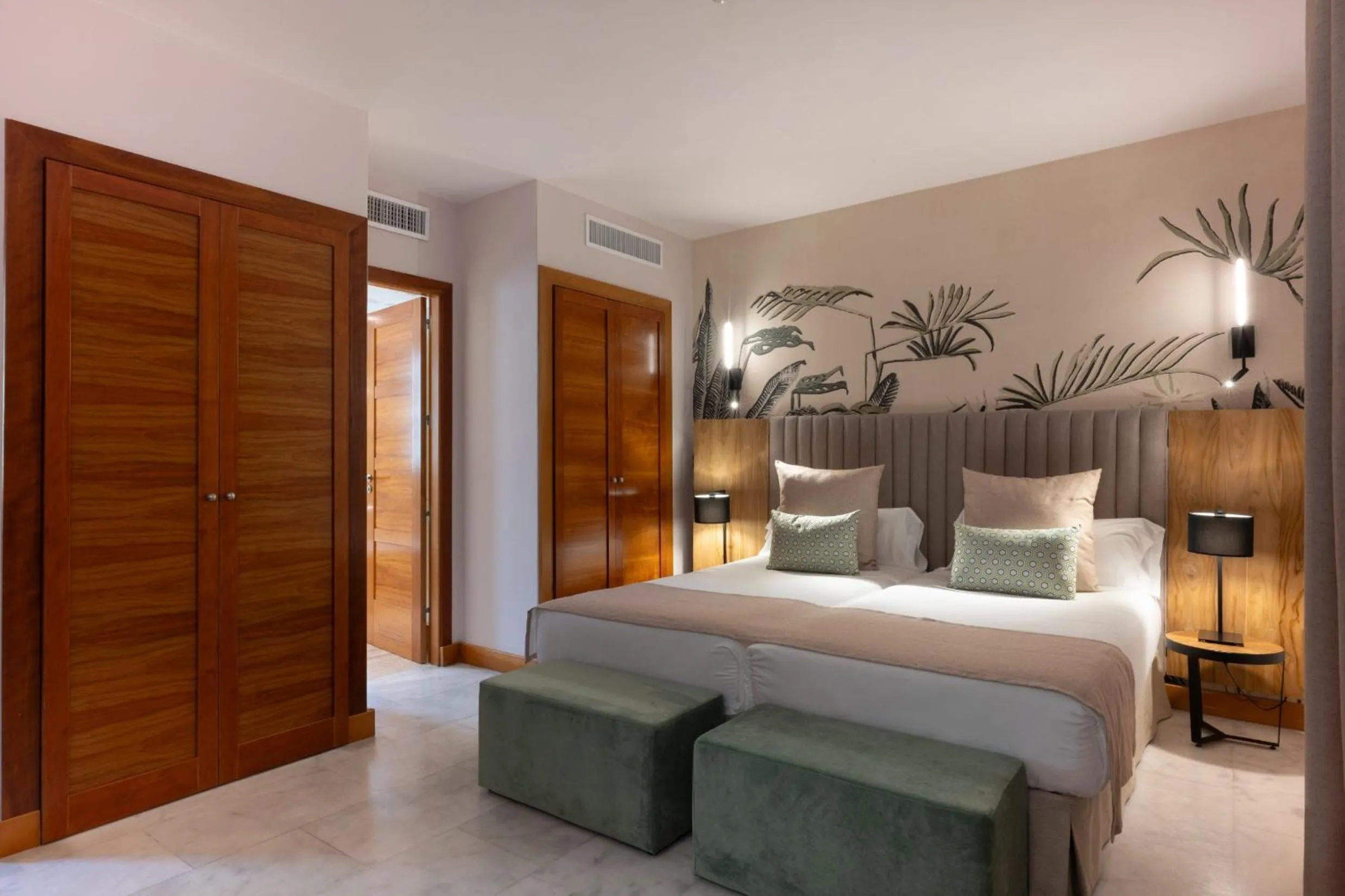 Bed in Hotel Suite Villa Maria