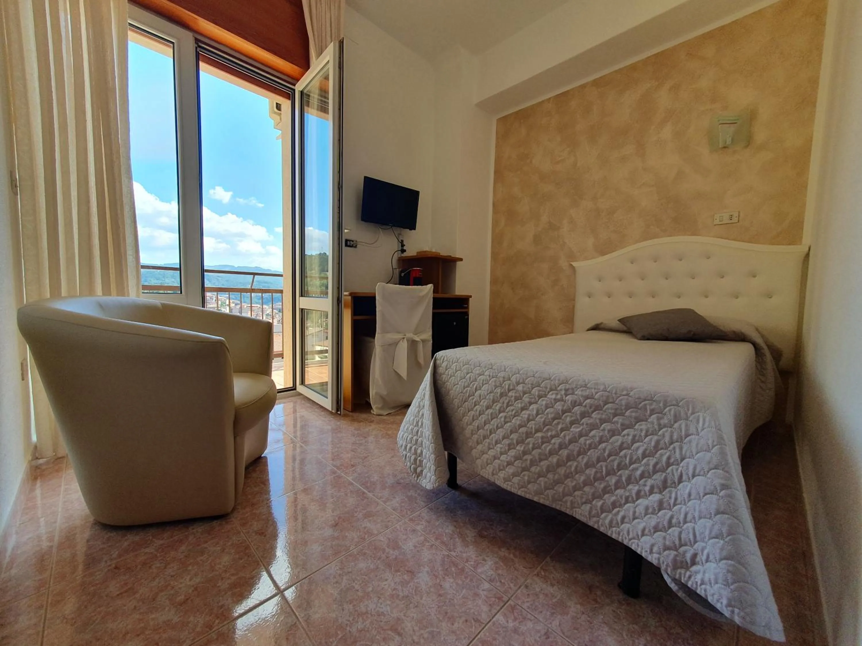 Photo of the whole room, Bed in Hotel Ristorante SUPERSONIK