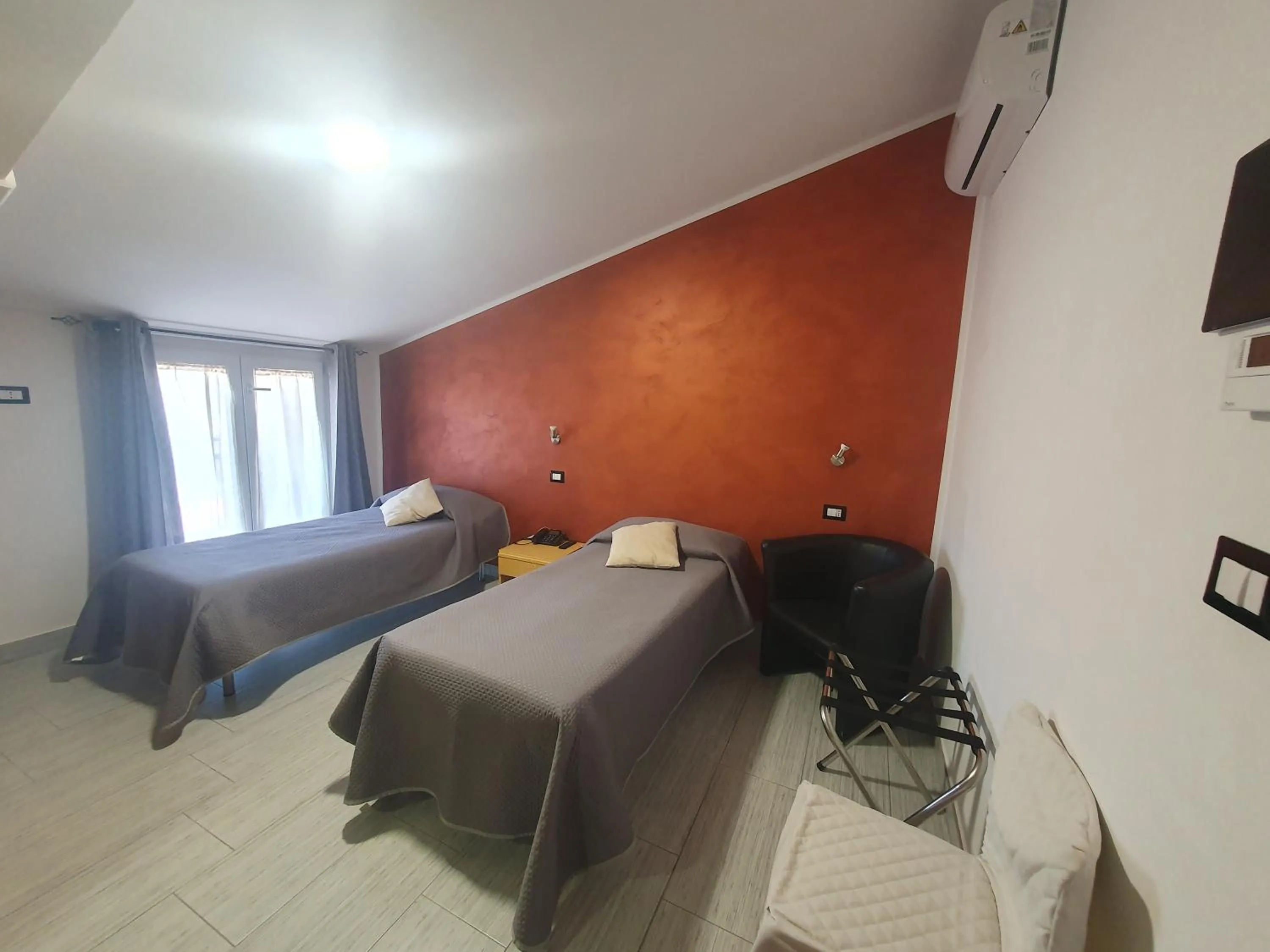 Photo of the whole room, Bed in Hotel Ristorante SUPERSONIK