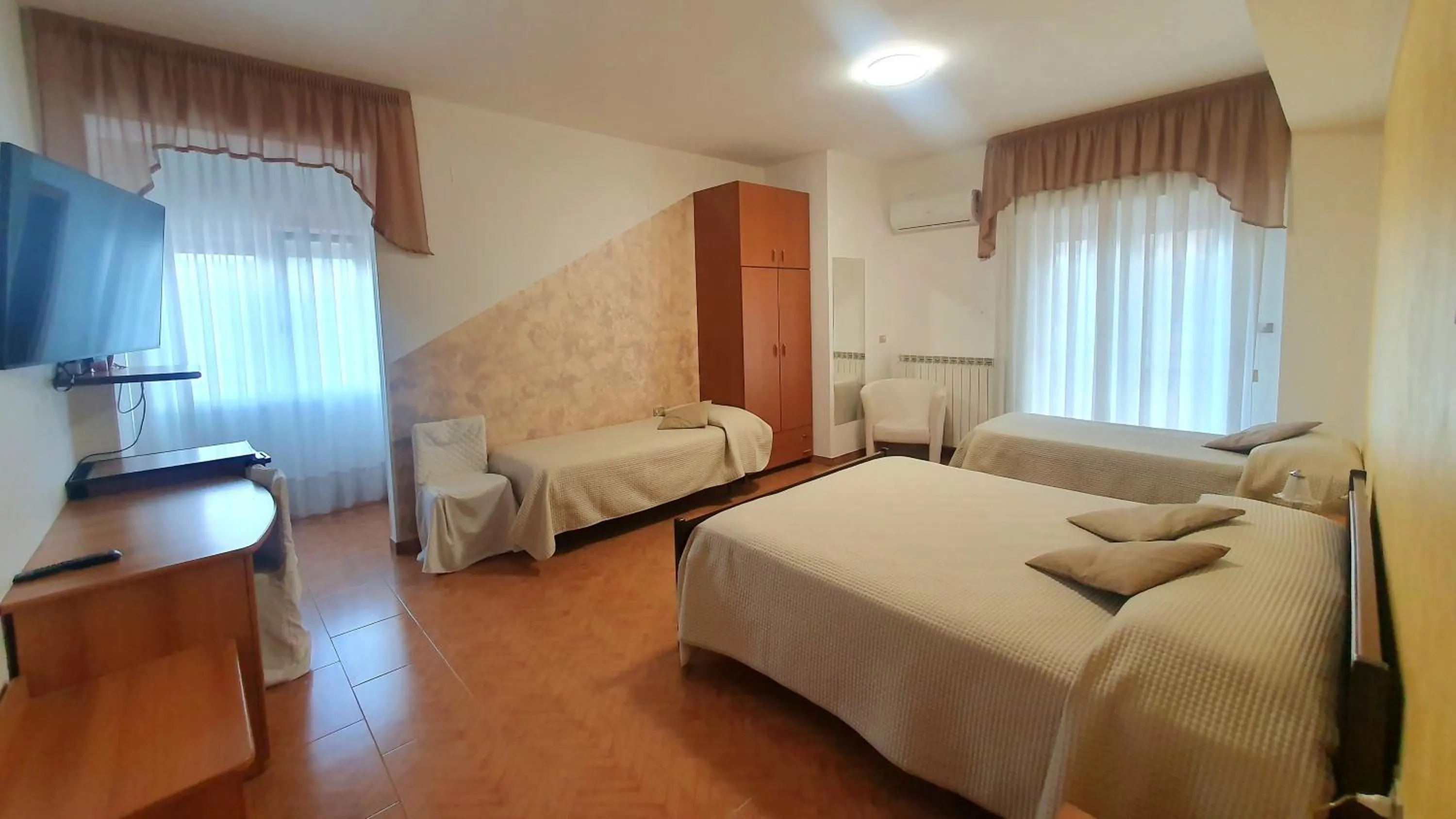 Photo of the whole room, Bed in Hotel Ristorante SUPERSONIK