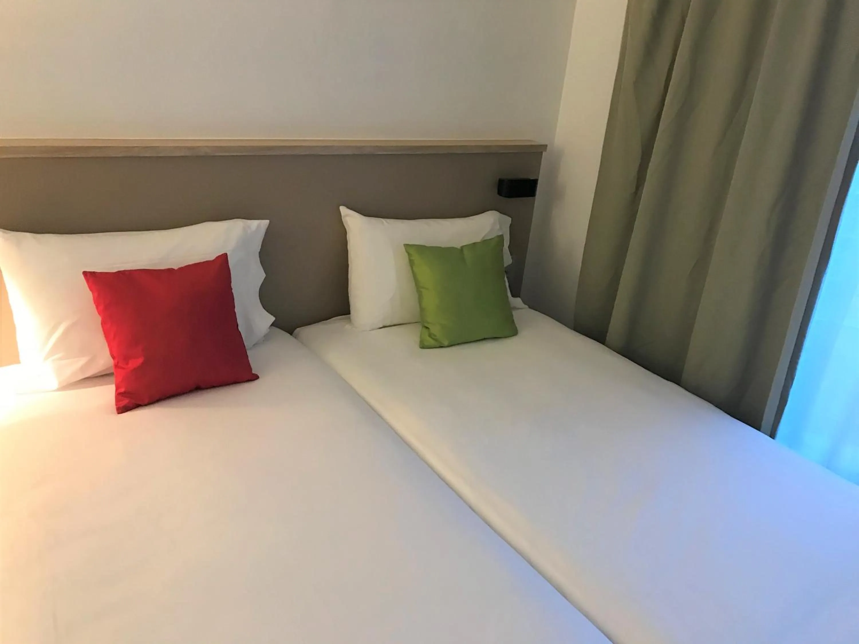 Bed in AMHotel Italie