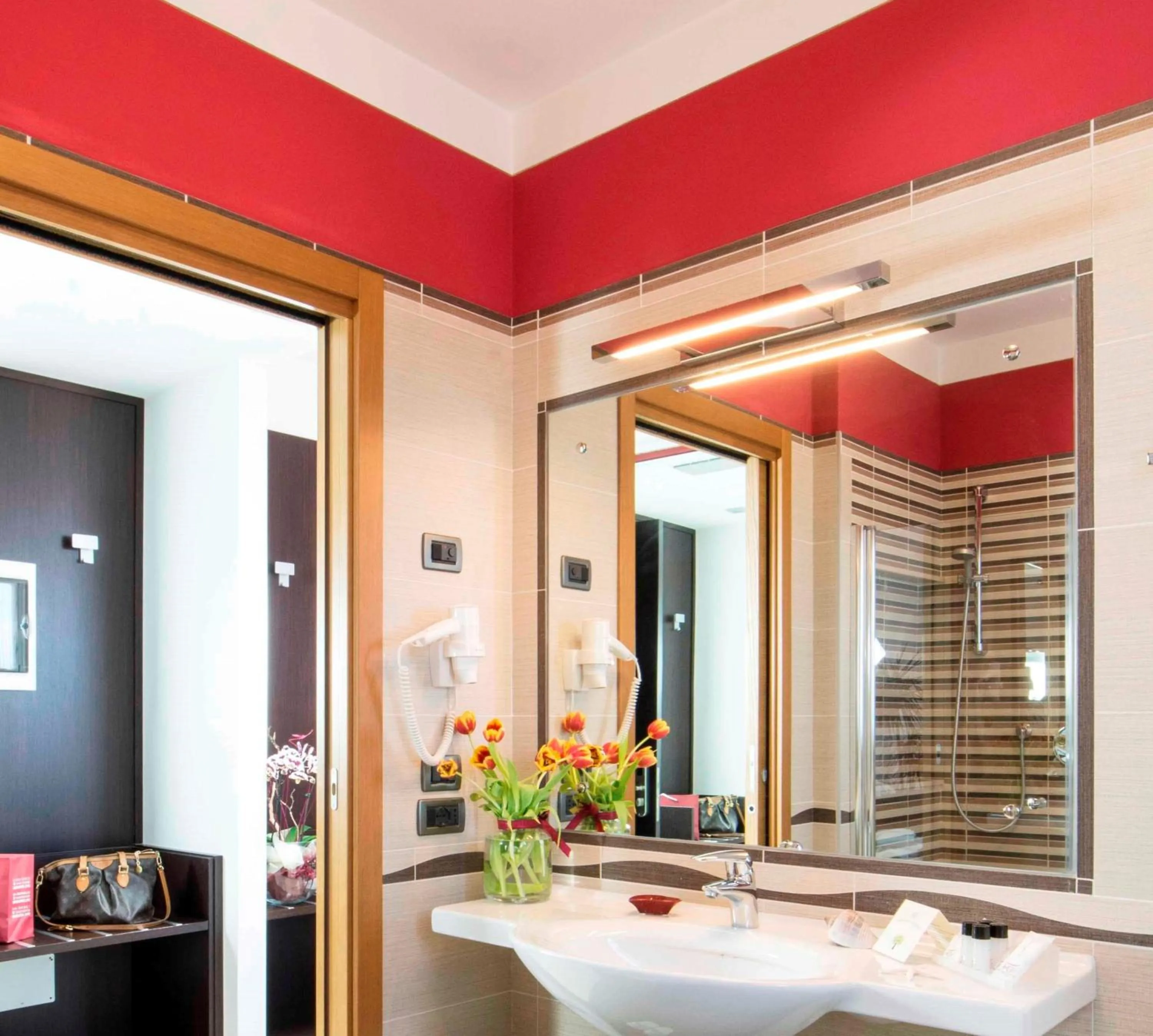 Bathroom in Kairos Garda Hotel