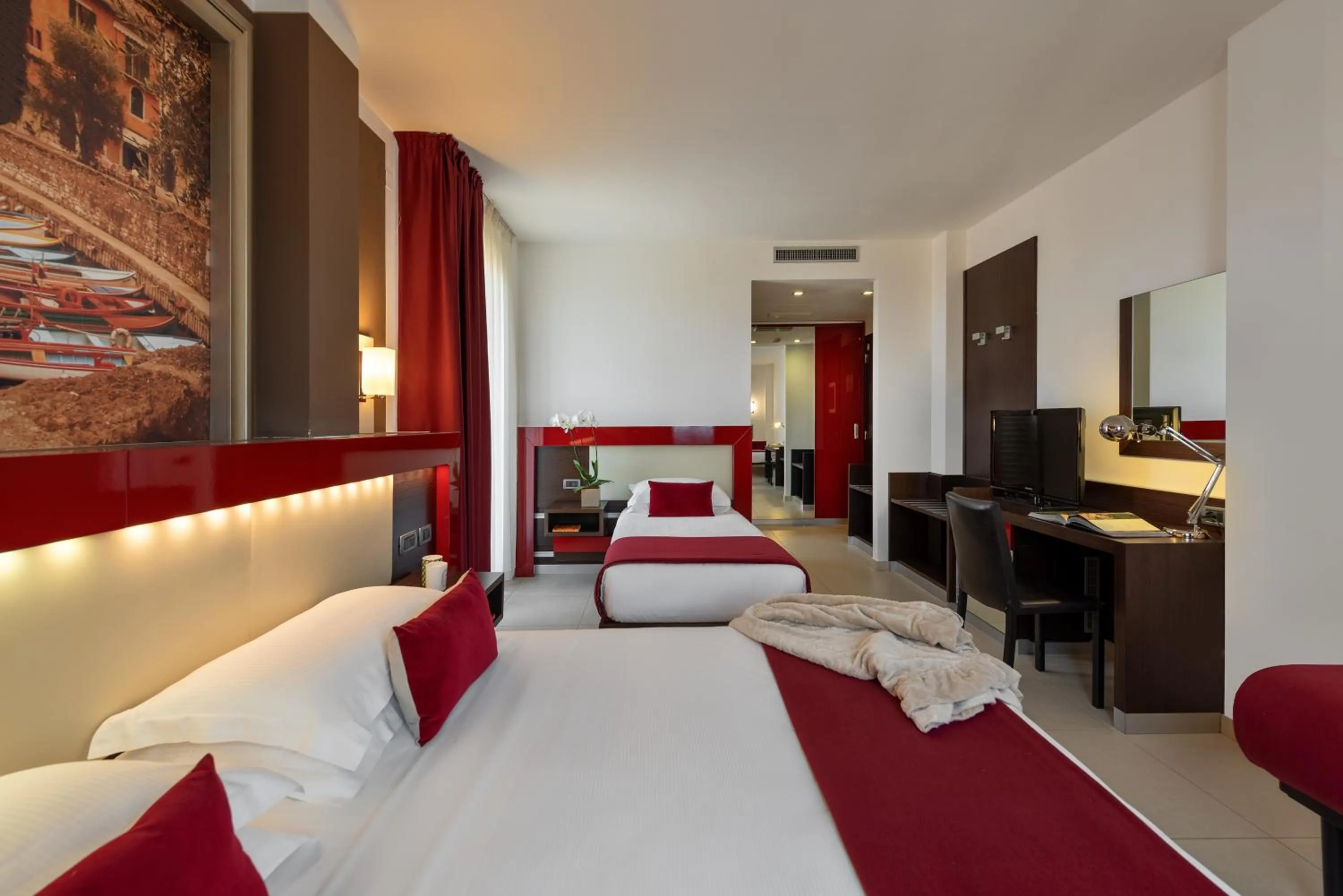 Bed in Kairos Garda Hotel