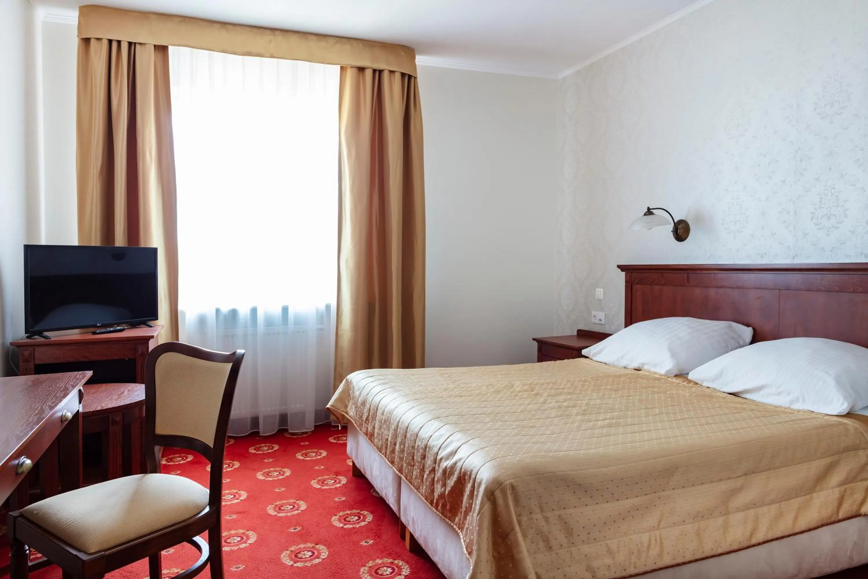 Bed in Hotel Arkadia Royal