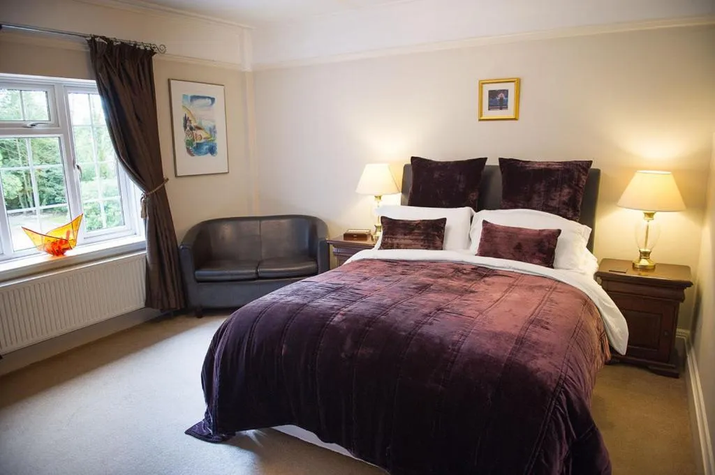 Bed in Claverton Country House Hotel