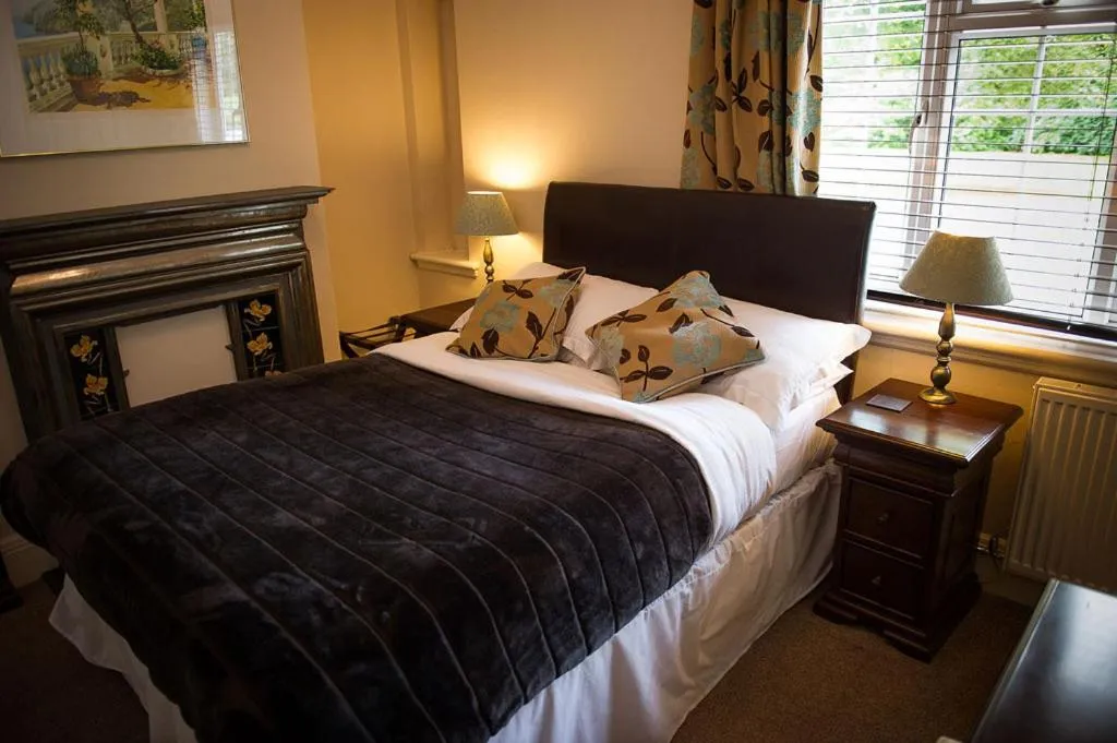 Bed in Claverton Country House Hotel