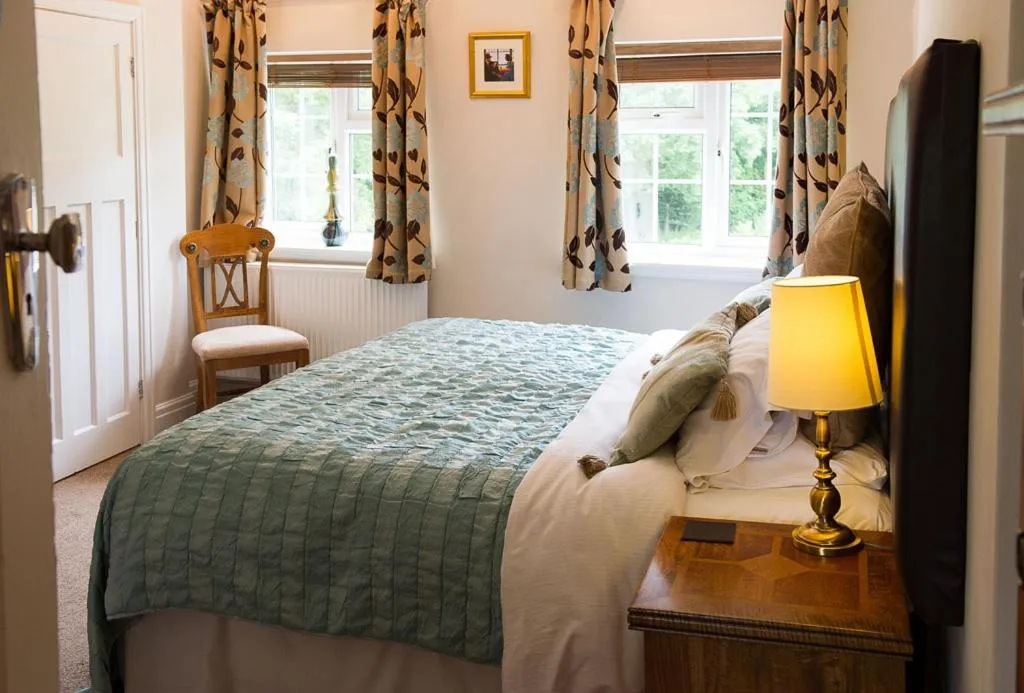 Bed in Claverton Country House Hotel