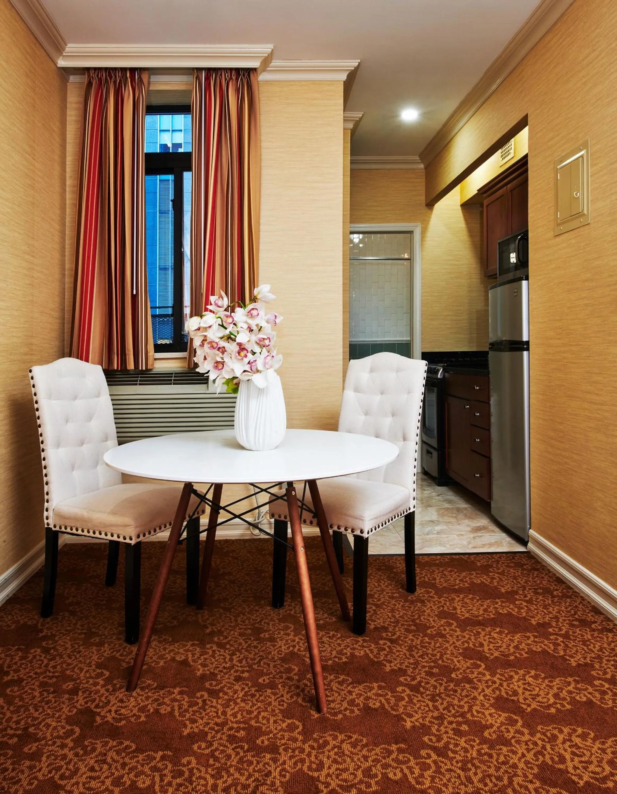 Kitchen or kitchenette in Radio City Apartments