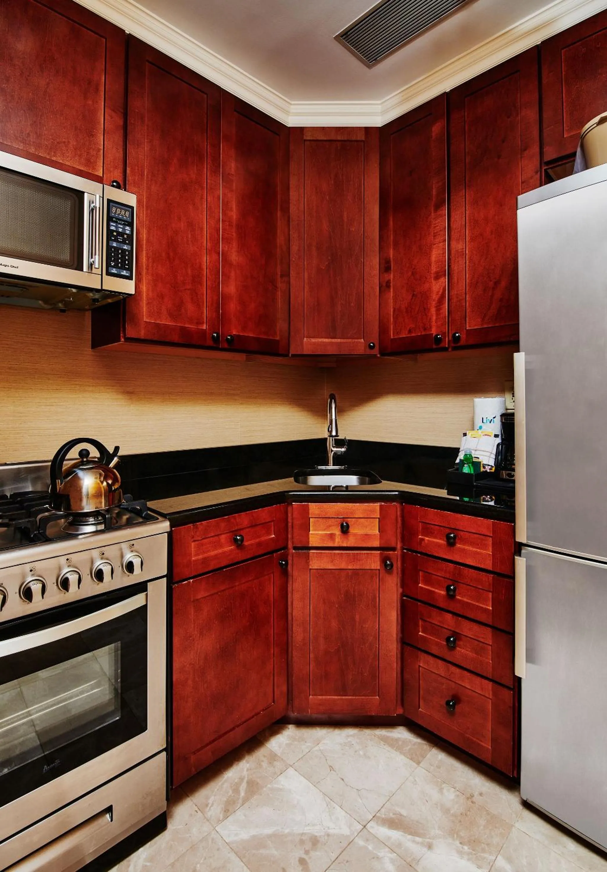 Kitchen or kitchenette in Radio City Apartments