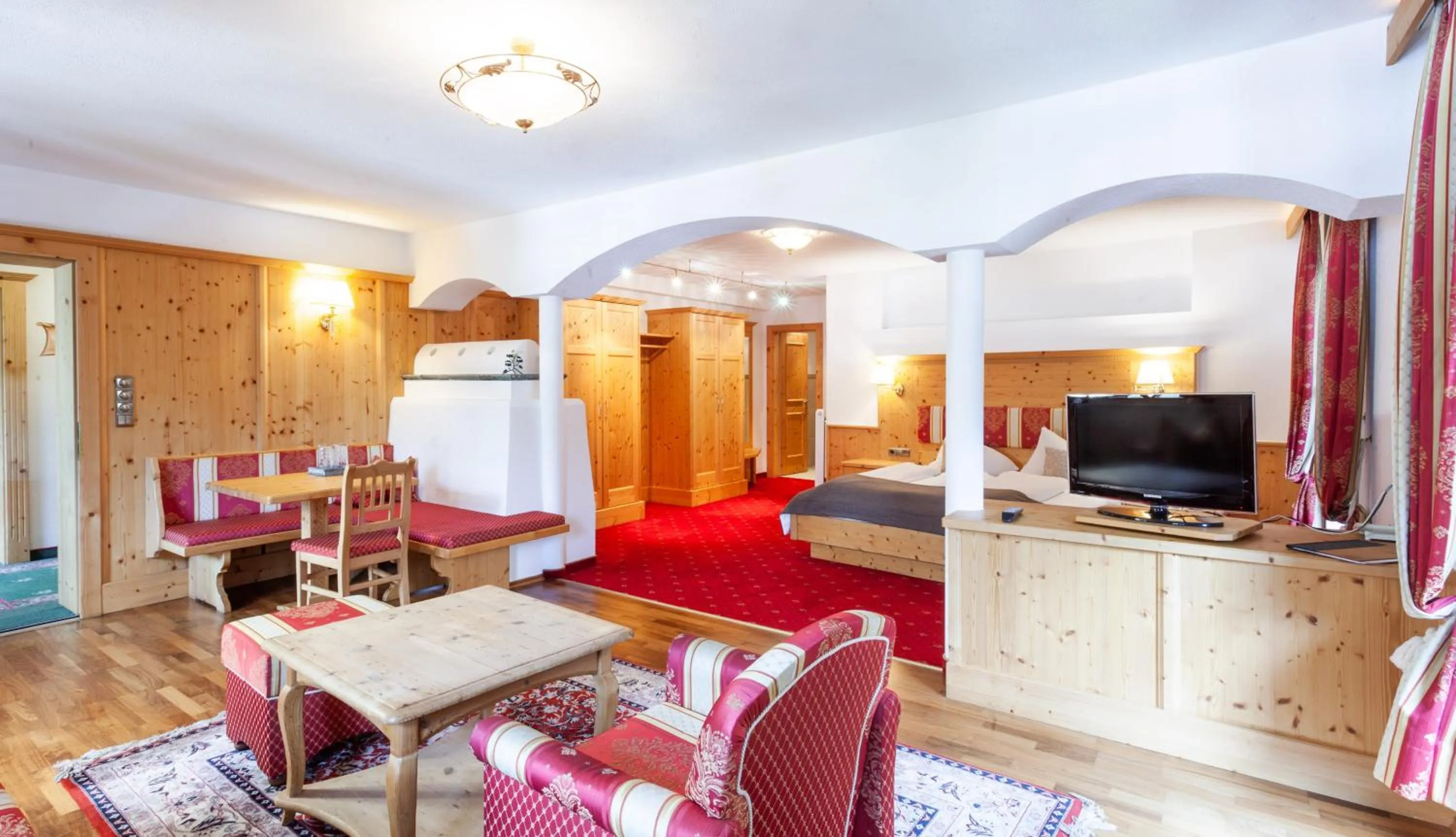 Living room, Bed in Hotel Stern