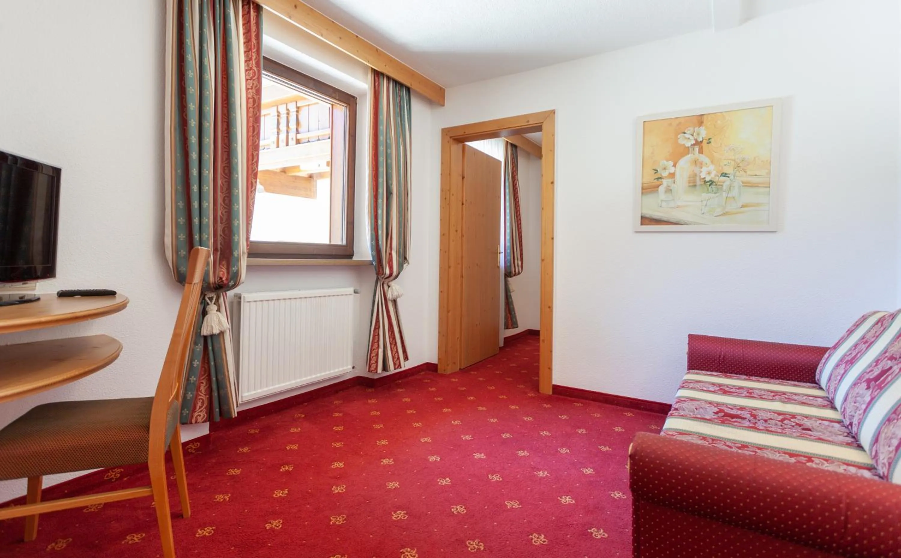 Living room, Bed in Hotel Stern