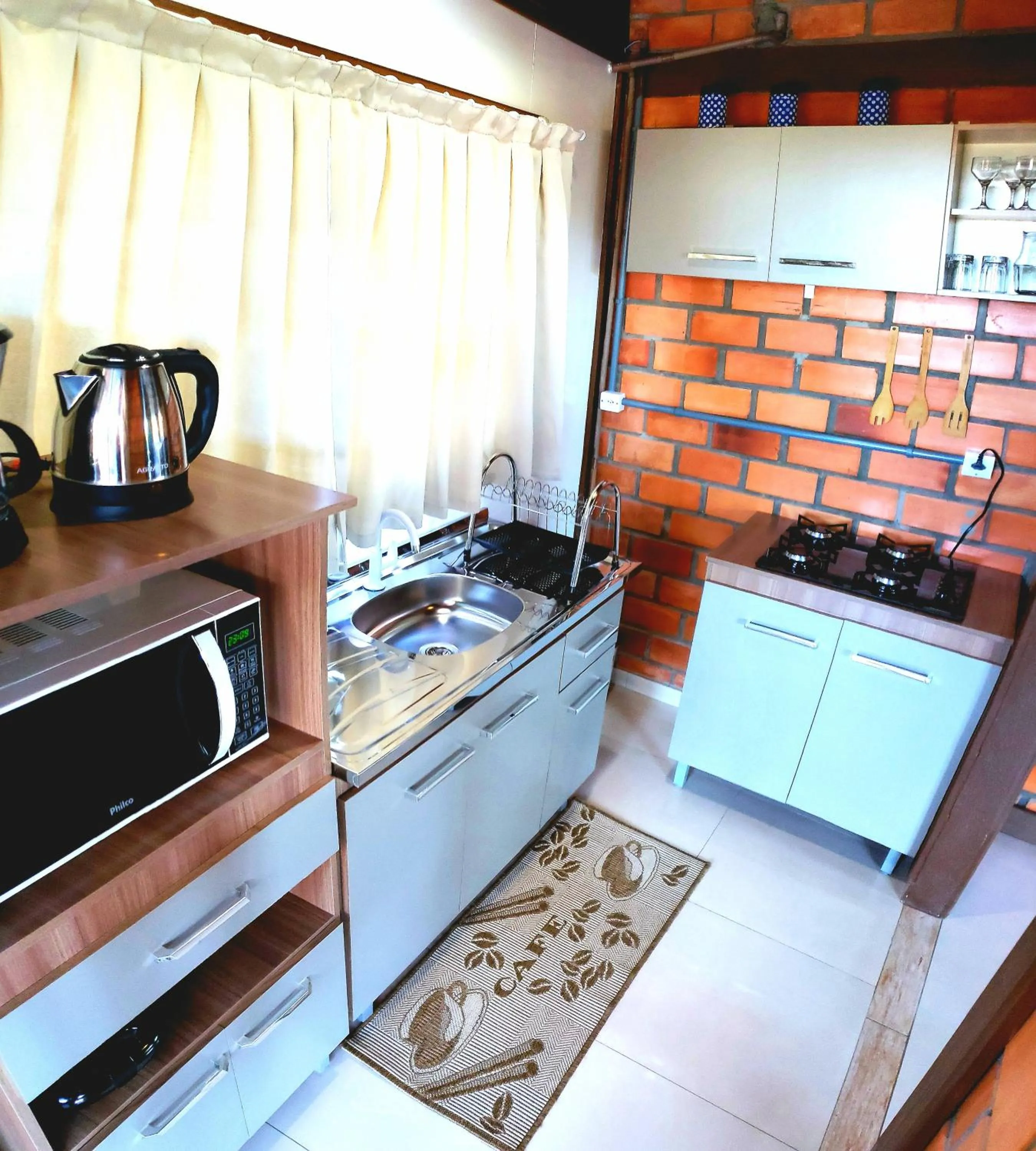 Kitchen or kitchenette in Pousada Doce Mar