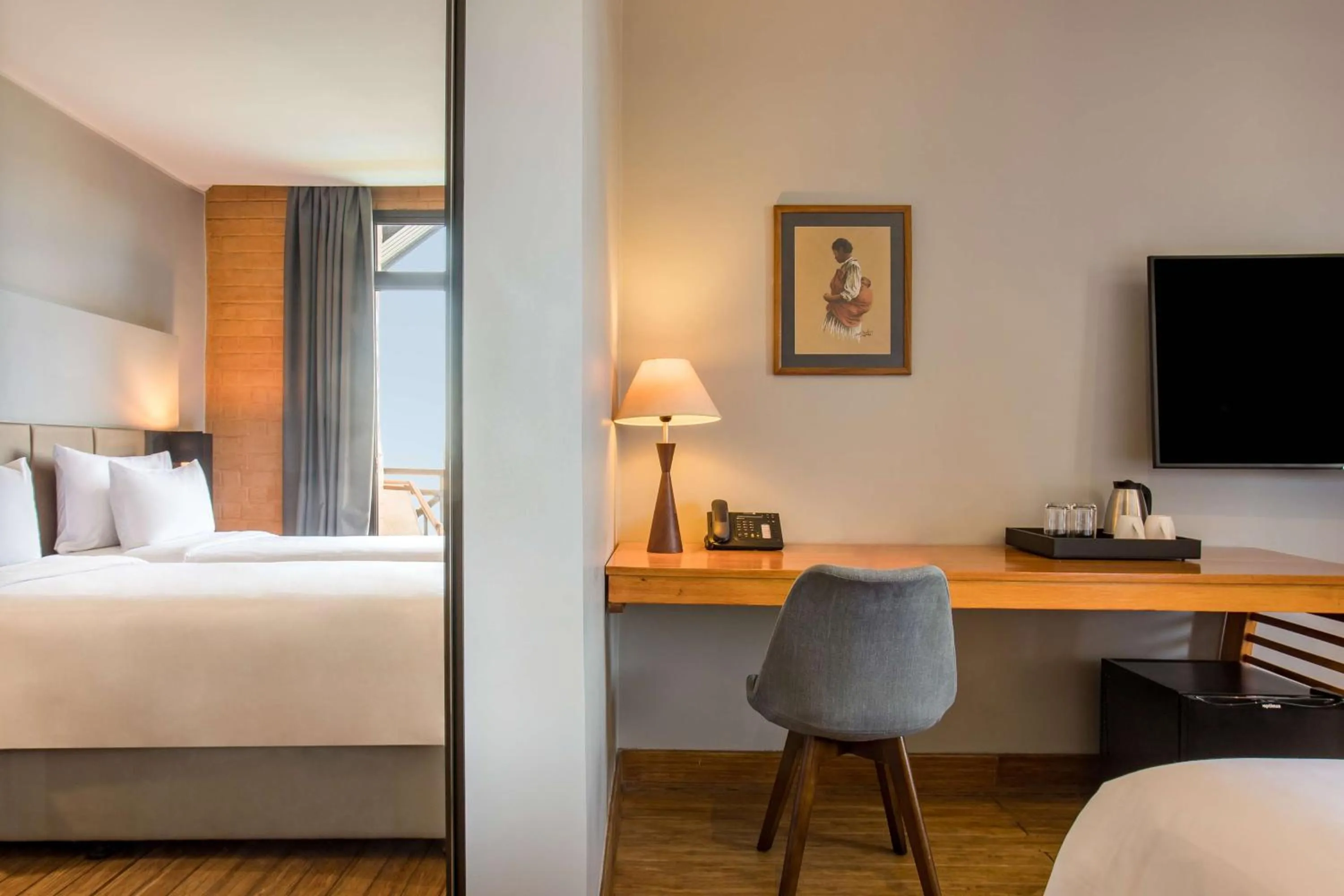 Photo of the whole room, Bed in Radisson Hotel Tamboho Waterfront Antananarivo