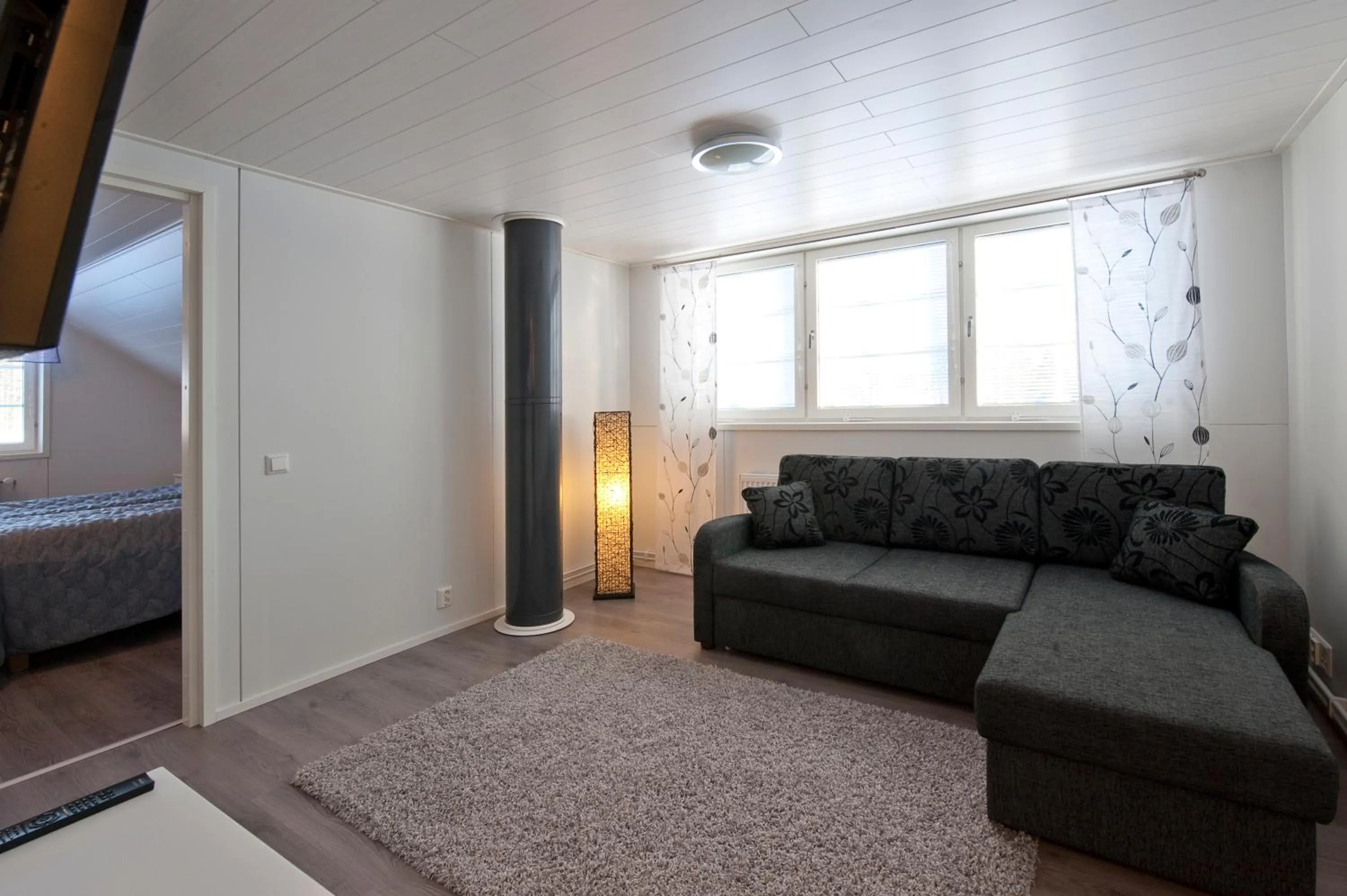 Living room, Bed in Kajaani Cottages