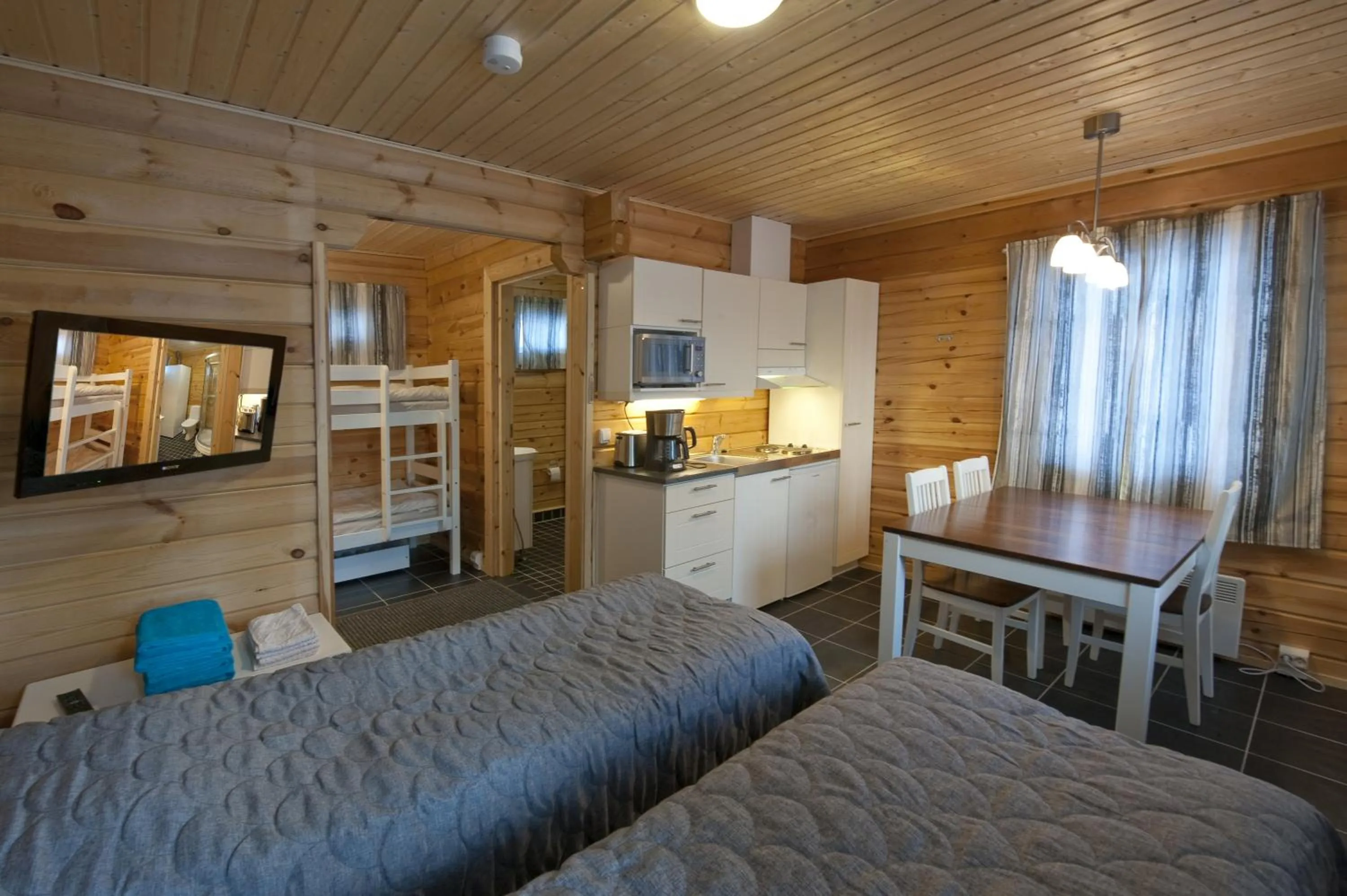 Photo of the whole room, Bed in Kajaani Cottages