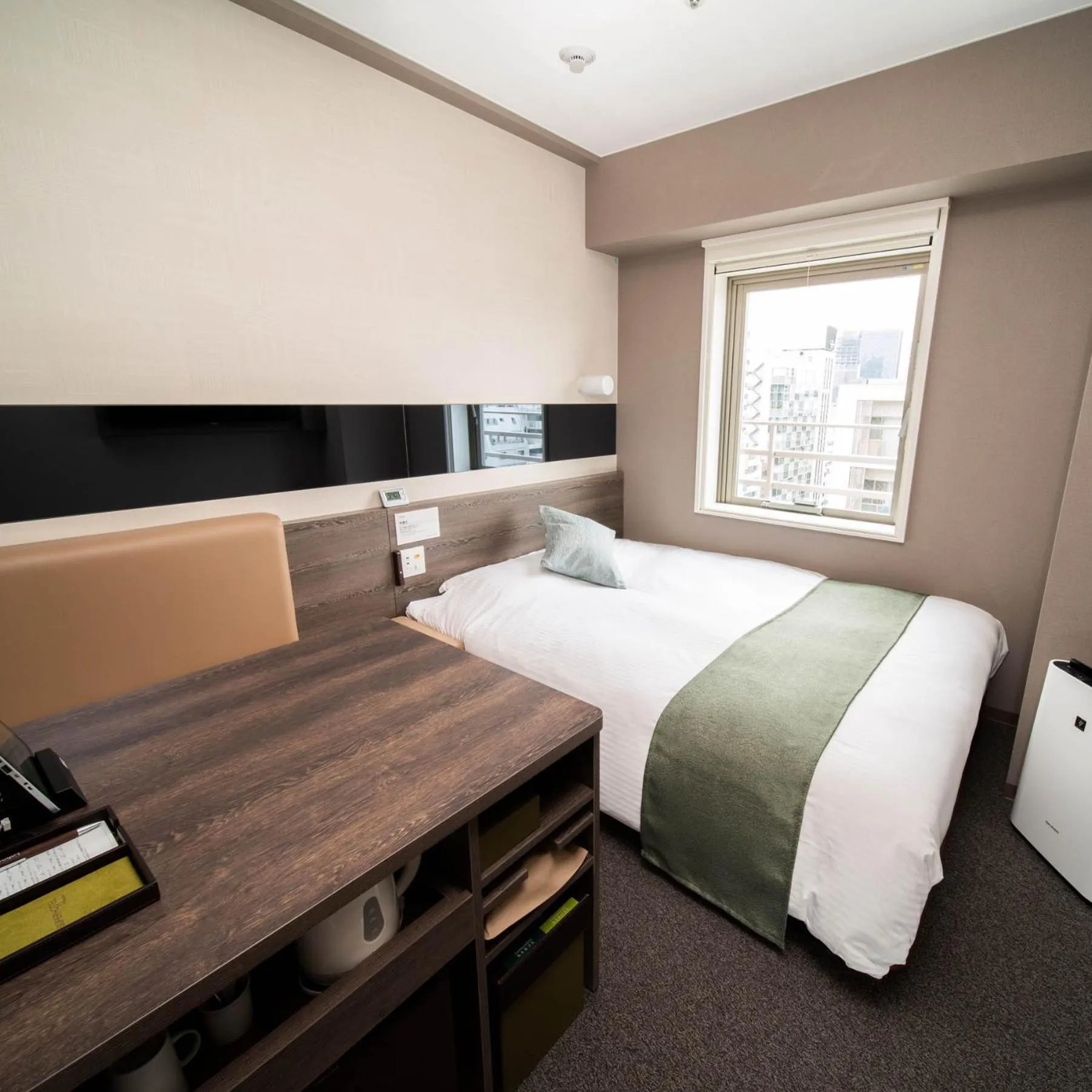 Bed in Super Hotel Premier Ginza