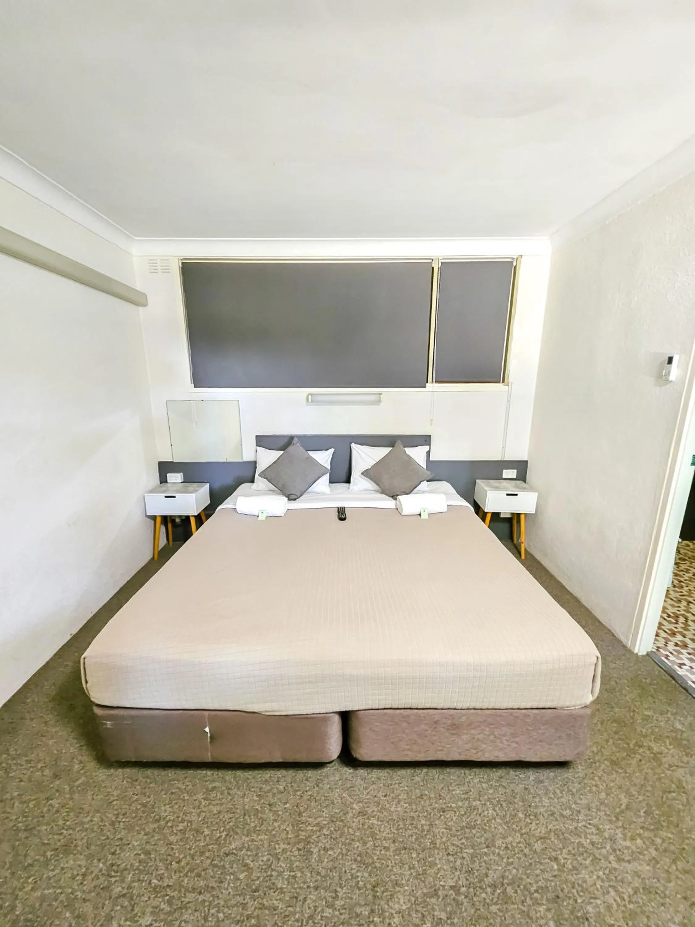 Bed in Green Door Motel