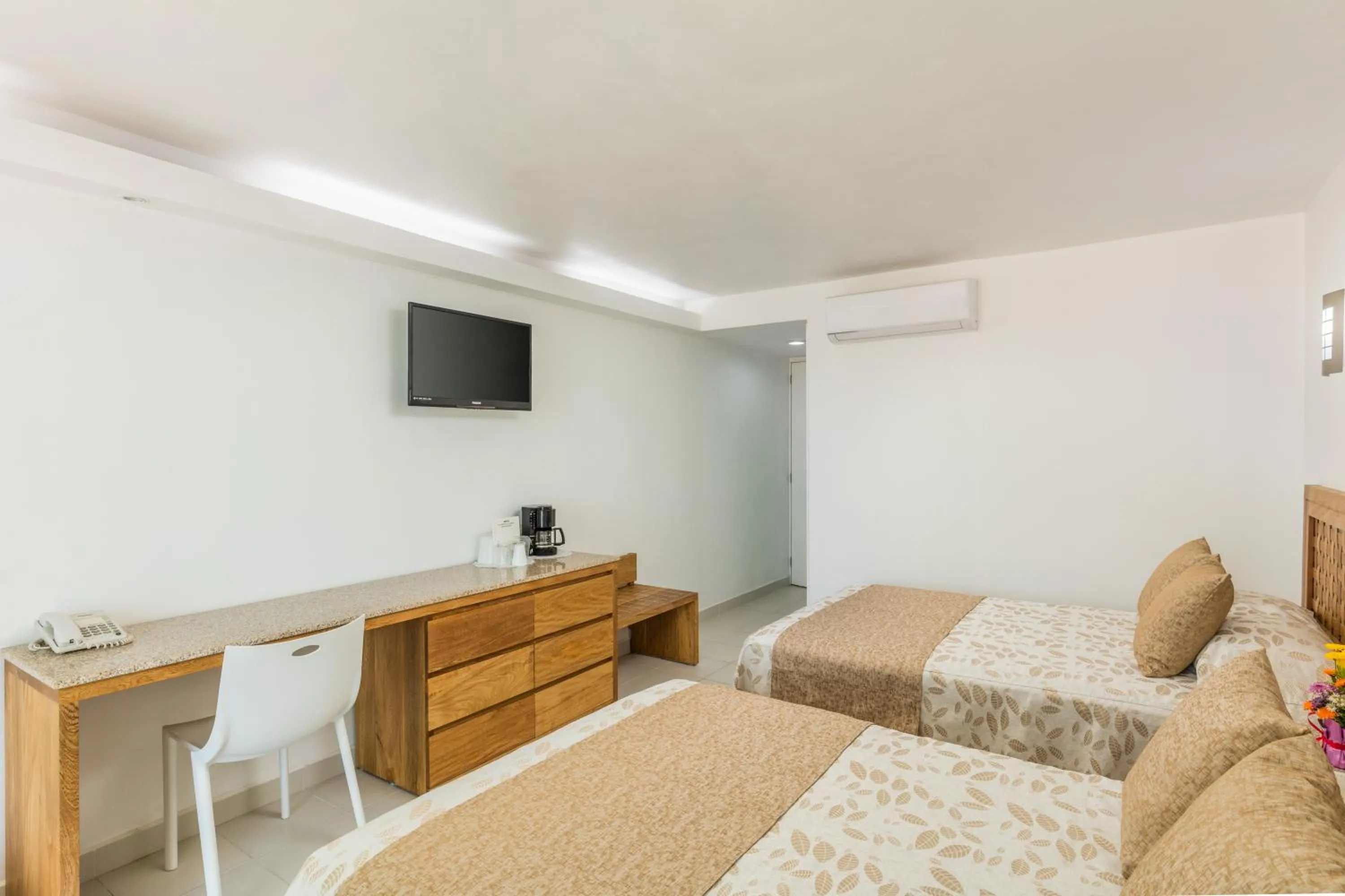 Bed in Posada Real Ixtapa