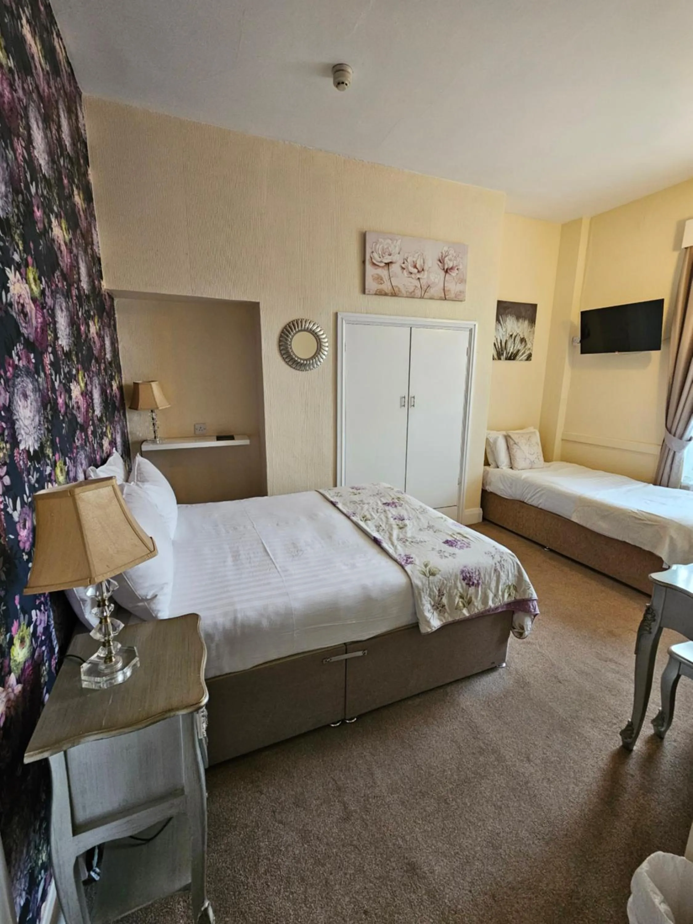 Bed in Rivelyn Hotel Bar & Restaurant