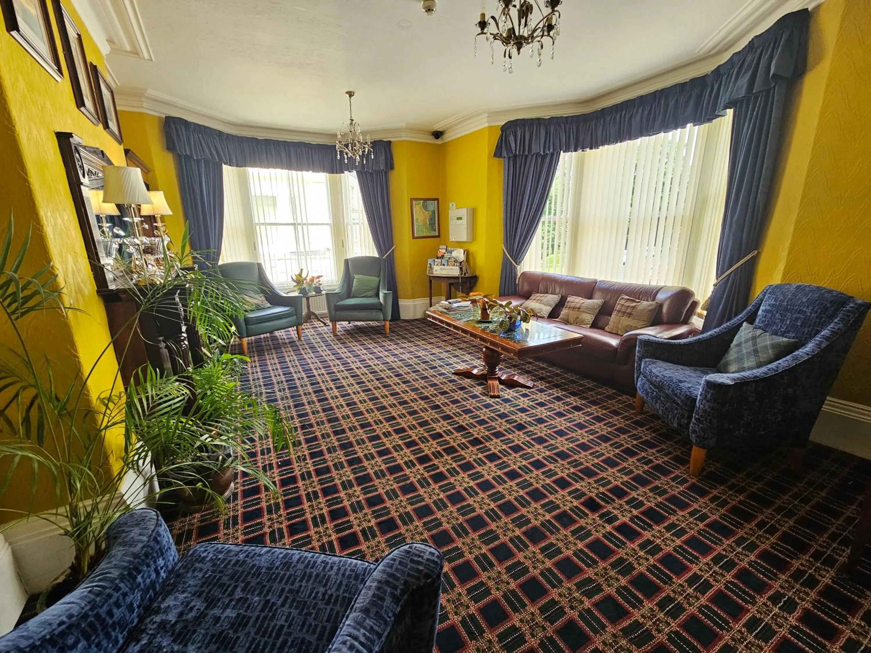 Communal lounge/ TV room in Rivelyn Hotel Bar & Restaurant