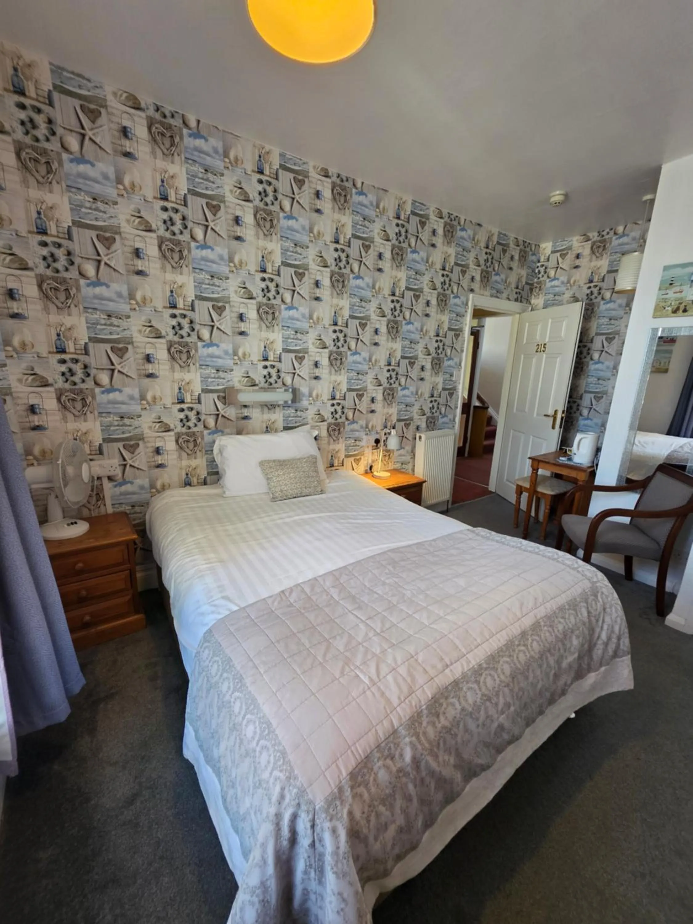 Bed in Rivelyn Hotel Bar & Restaurant