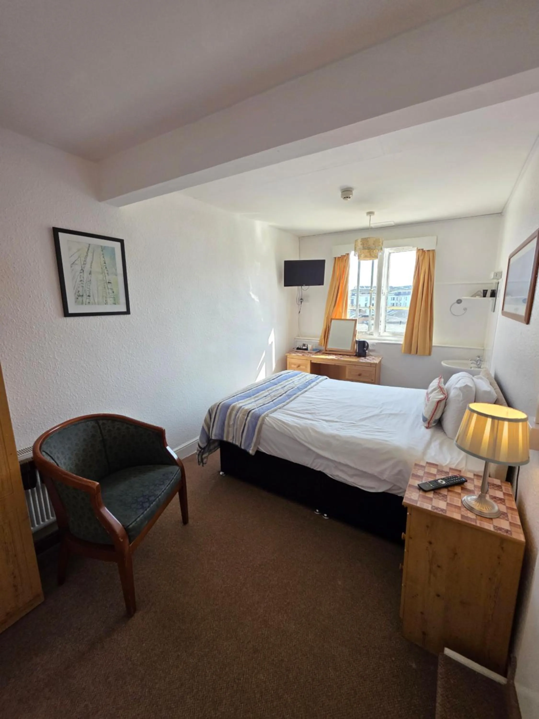 Bed in Rivelyn Hotel Bar & Restaurant