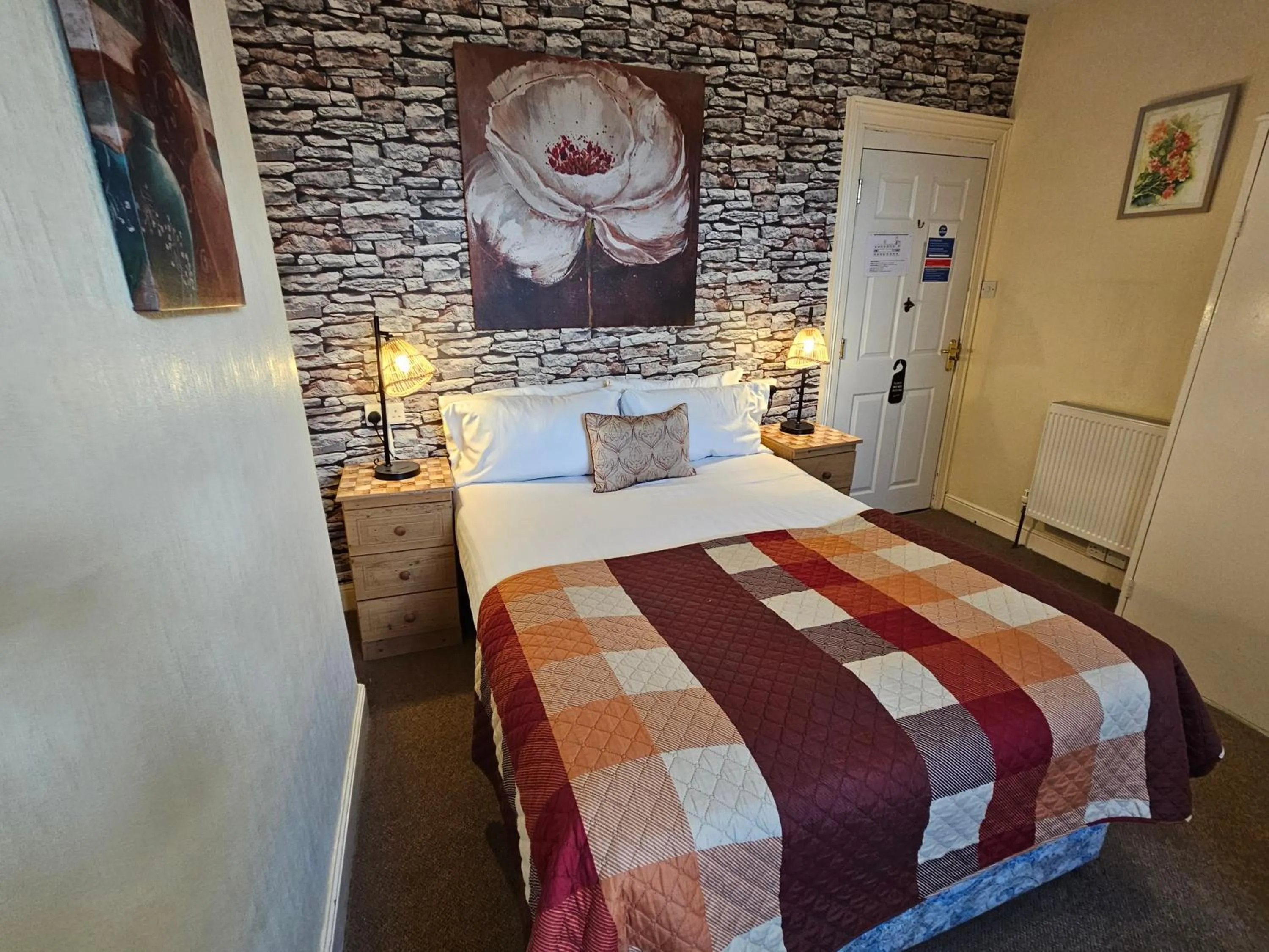 Bed in Rivelyn Hotel Bar & Restaurant