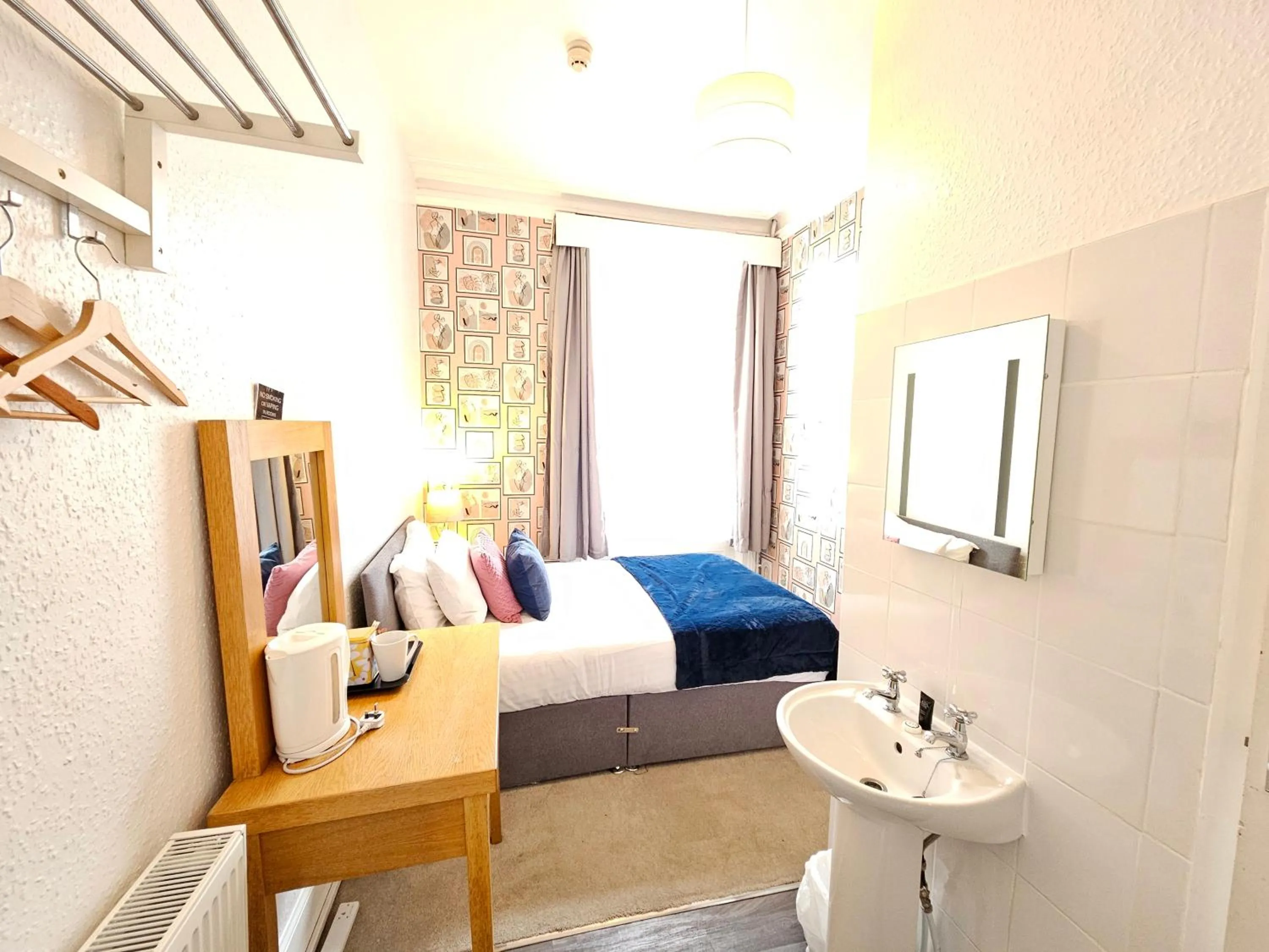 Bed in Rivelyn Hotel Bar & Restaurant