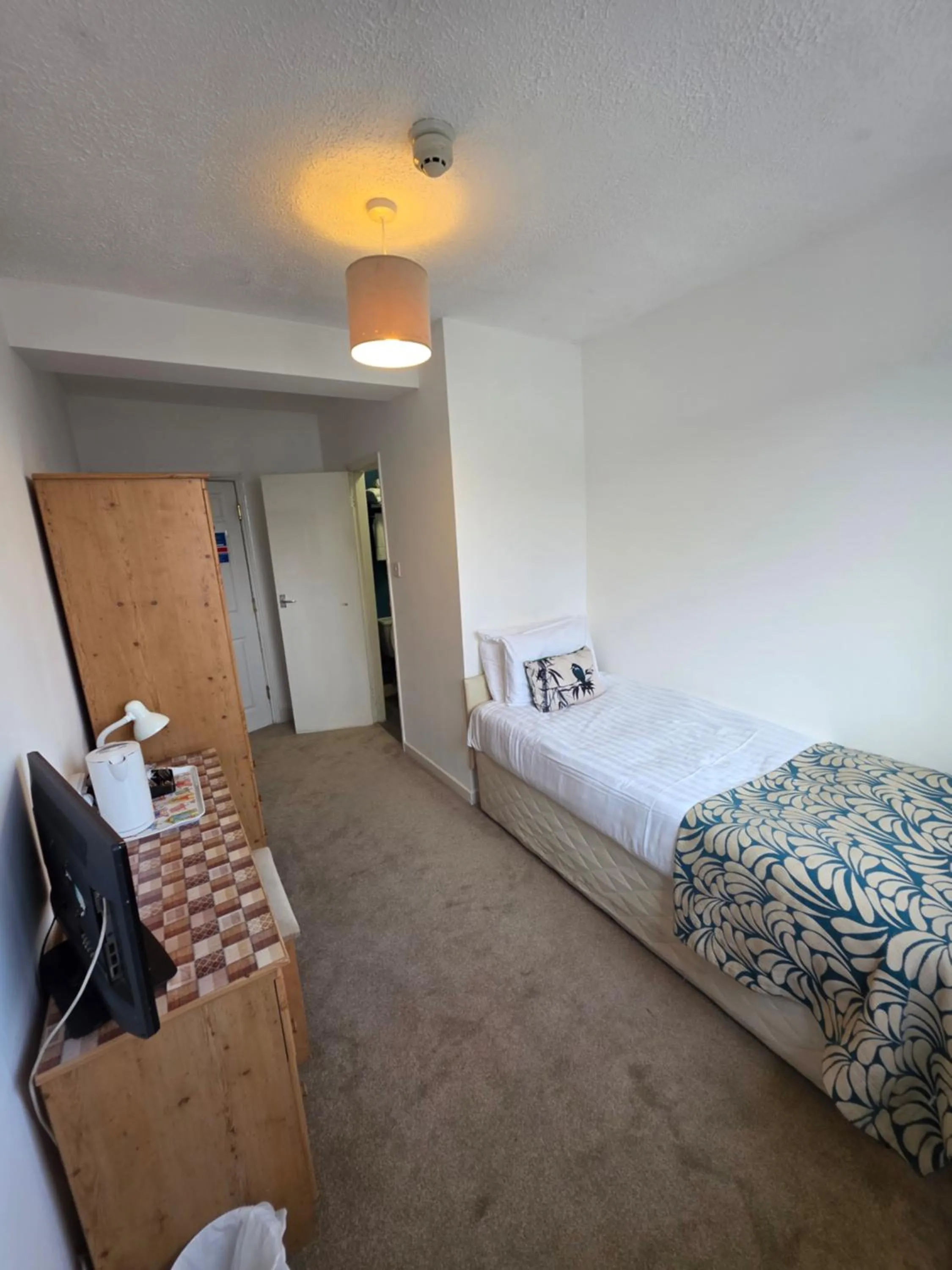 Bed in Rivelyn Hotel Bar & Restaurant