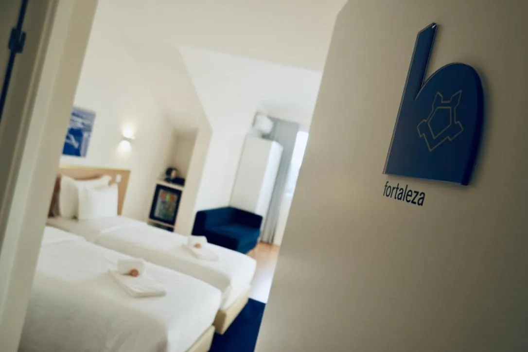 Bed in ó Poboa Guesthouse