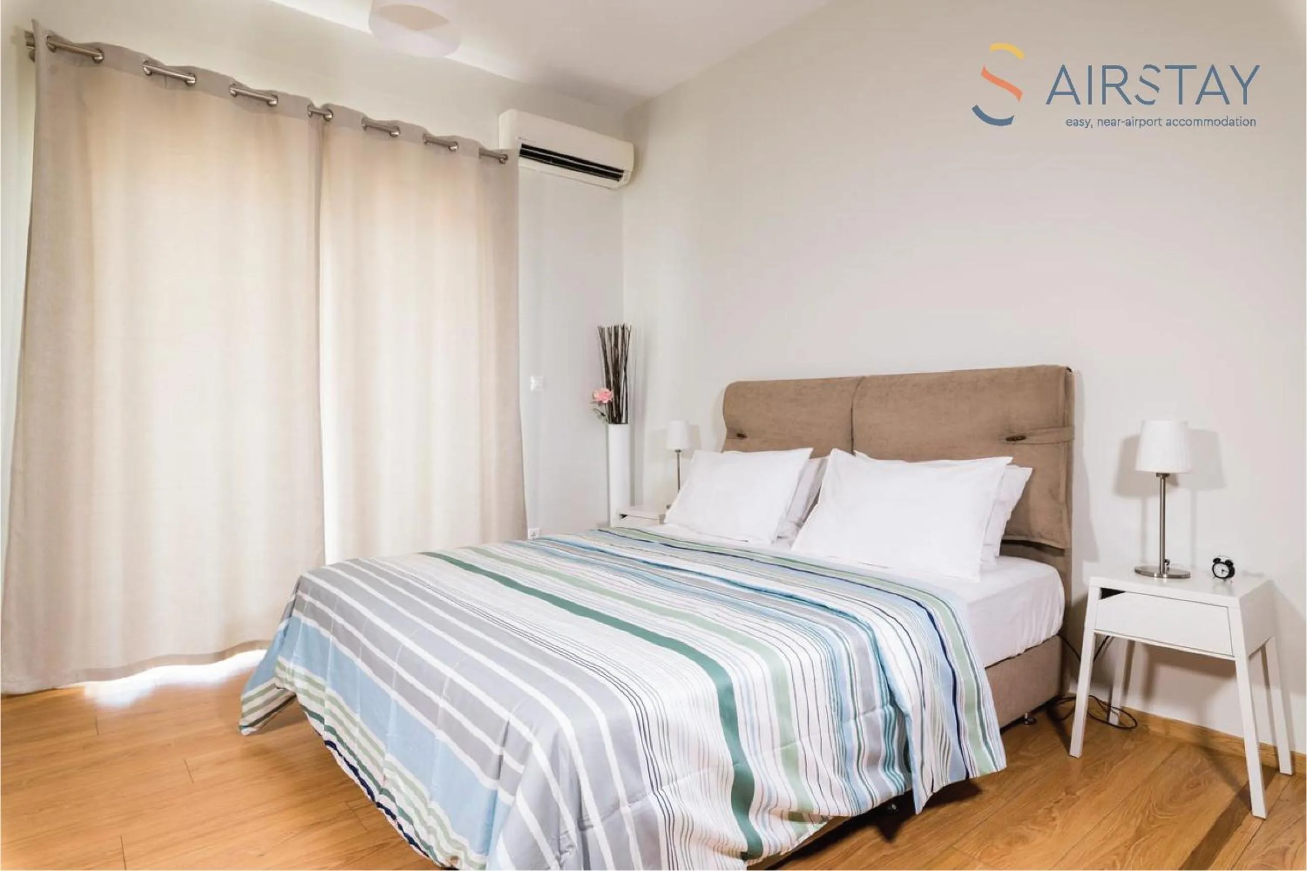 Bed in Anivia Apartments Airport by Airstay