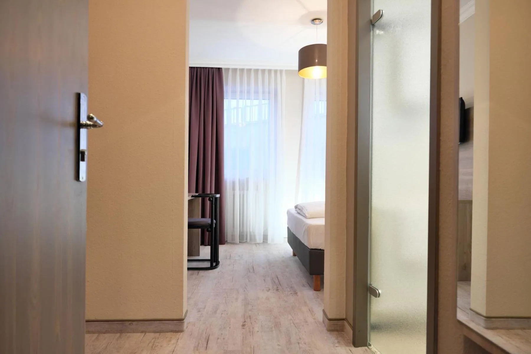 Photo of the whole room, Bed in Hotel Römerstadt