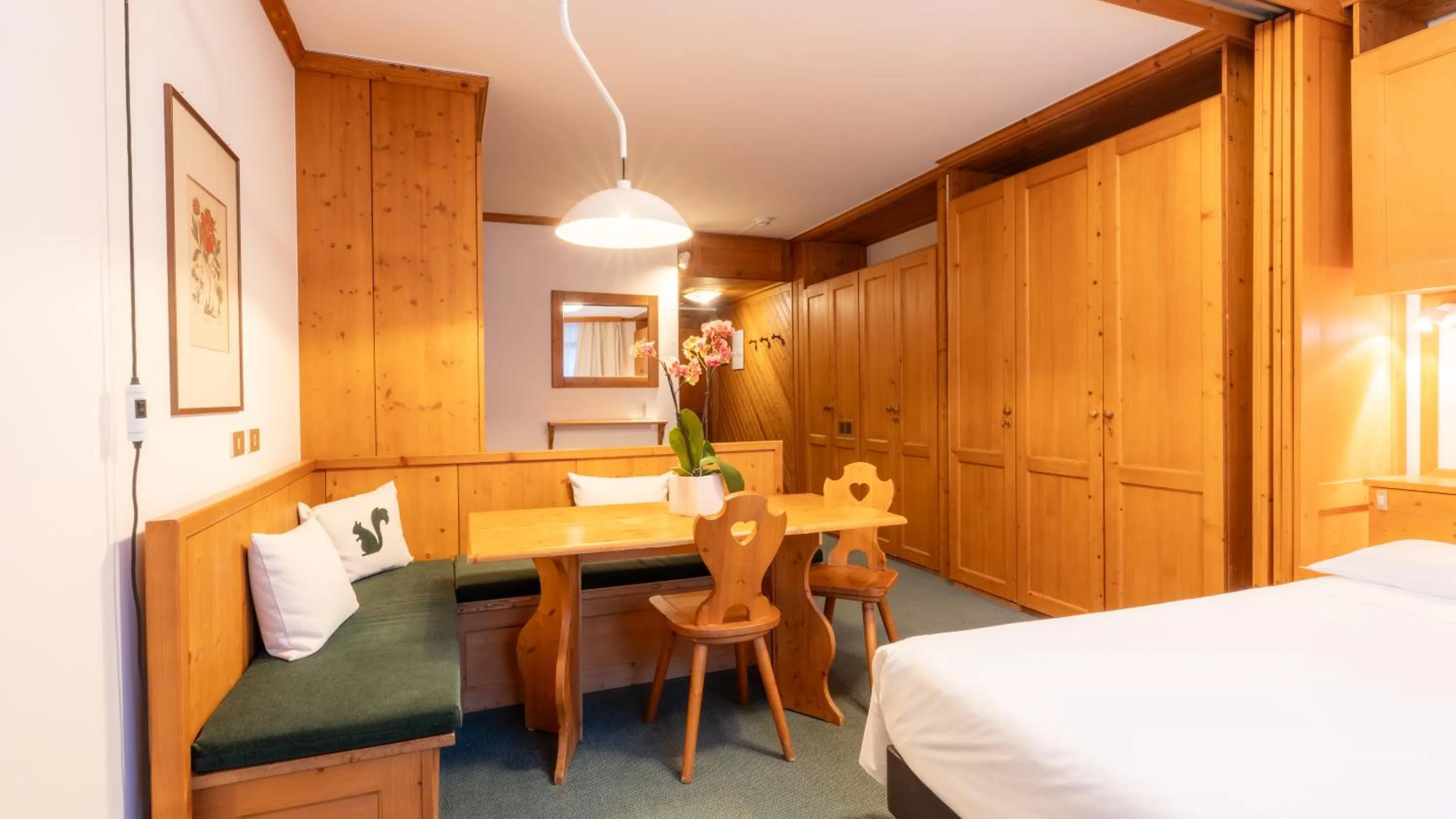 Bed in Hotel Cristallino d'Ampezzo